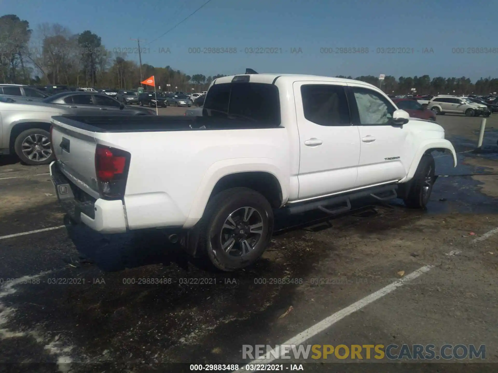 4 Photograph of a damaged car 5TFAZ5CN5KX077536 TOYOTA TACOMA 2WD 2019