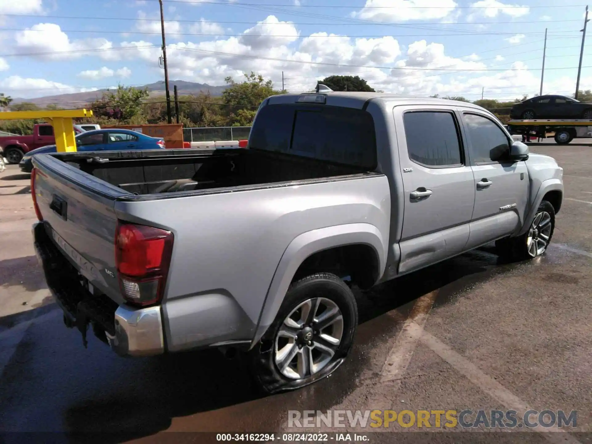 4 Photograph of a damaged car 5TFAZ5CN5KX082459 TOYOTA TACOMA 2WD 2019