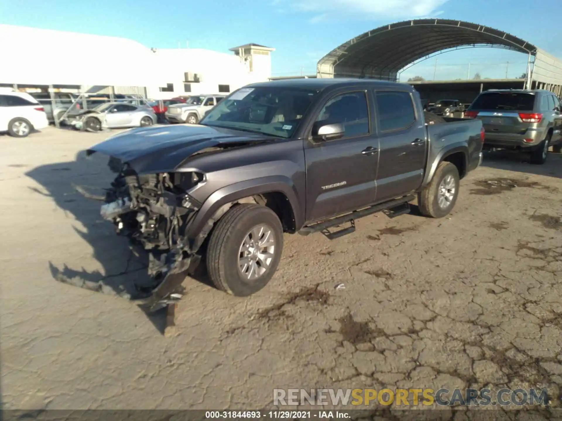 2 Photograph of a damaged car 5TFAZ5CN6KX086861 TOYOTA TACOMA 2WD 2019