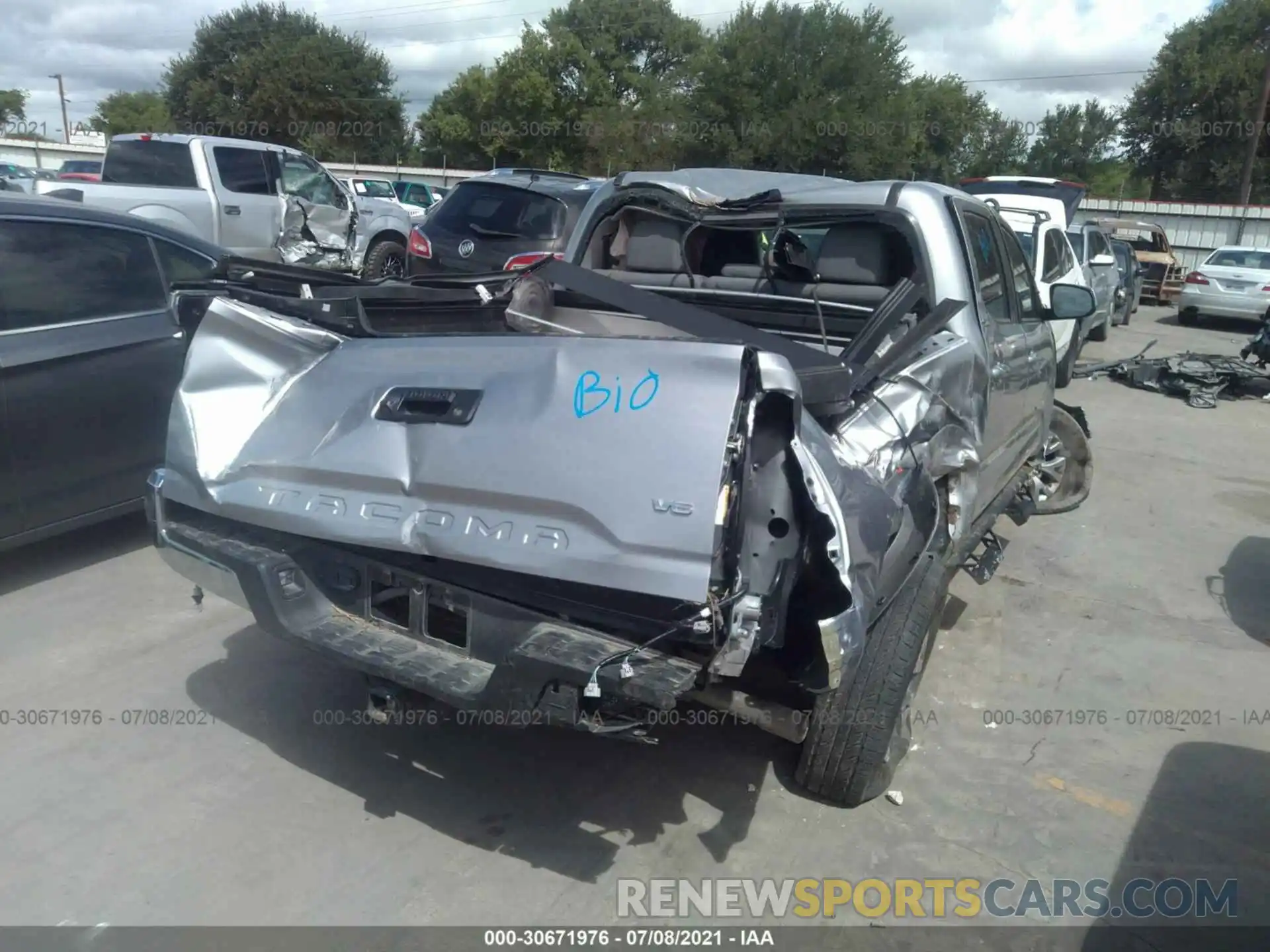 4 Photograph of a damaged car 5TFAZ5CN7KX086741 TOYOTA TACOMA 2WD 2019