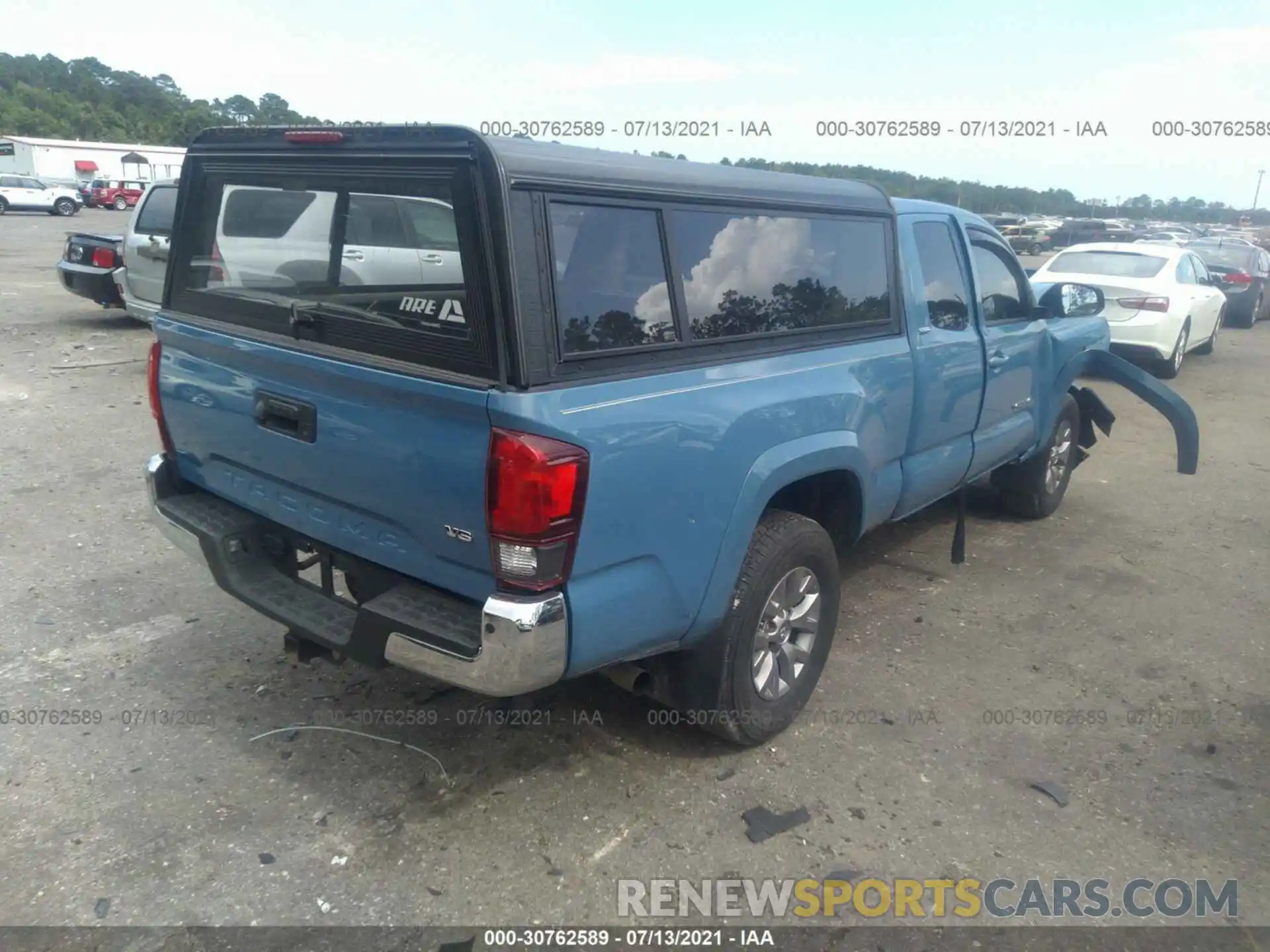 4 Photograph of a damaged car 5TFRZ5CN7KX083390 TOYOTA TACOMA 2WD 2019