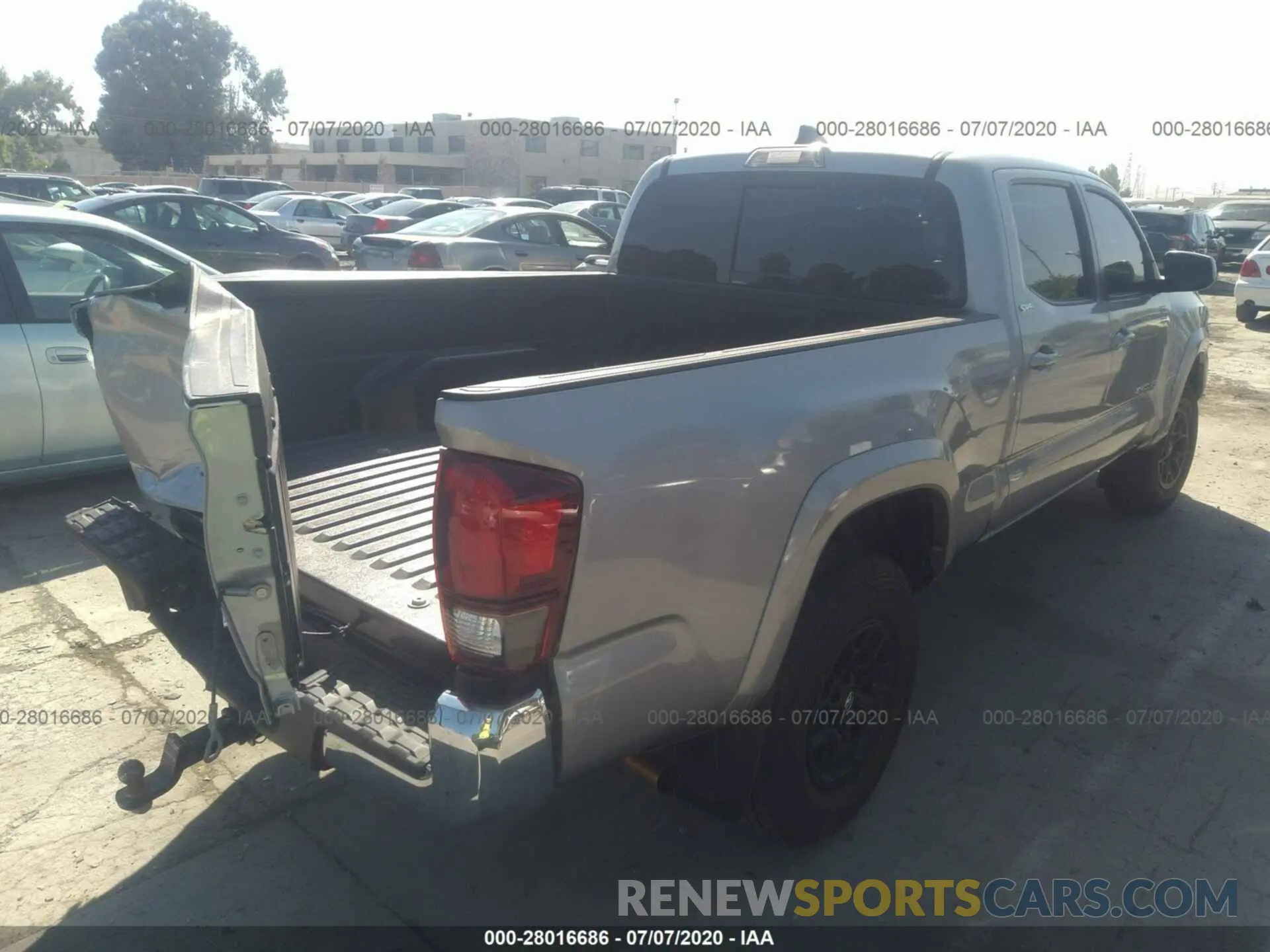 4 Photograph of a damaged car 3TMBZ5DN2LM023864 TOYOTA TACOMA 2WD 2020
