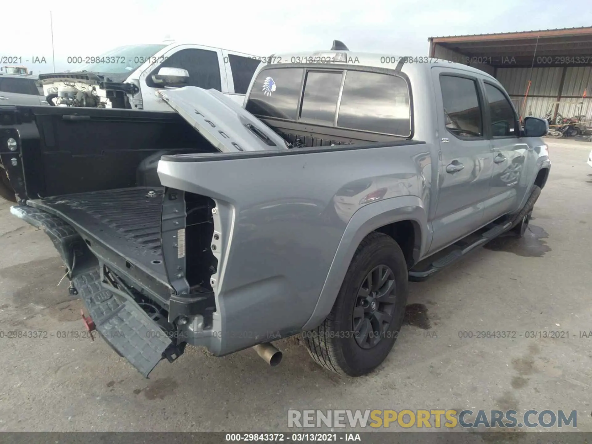 4 Photograph of a damaged car 5TFAX5GN2LX181239 TOYOTA TACOMA 2WD 2020