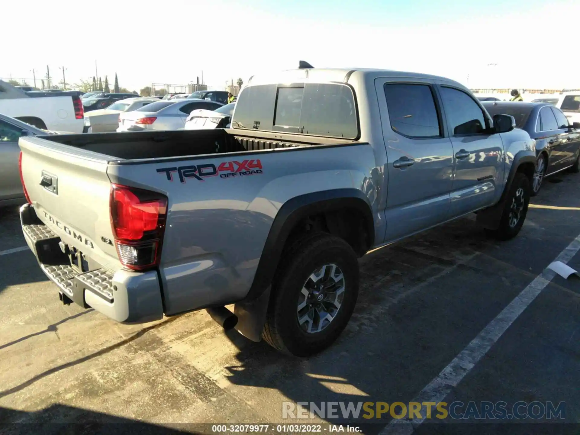 4 Photograph of a damaged car 3TMCZ5AN0KM200919 TOYOTA TACOMA 4WD 2019