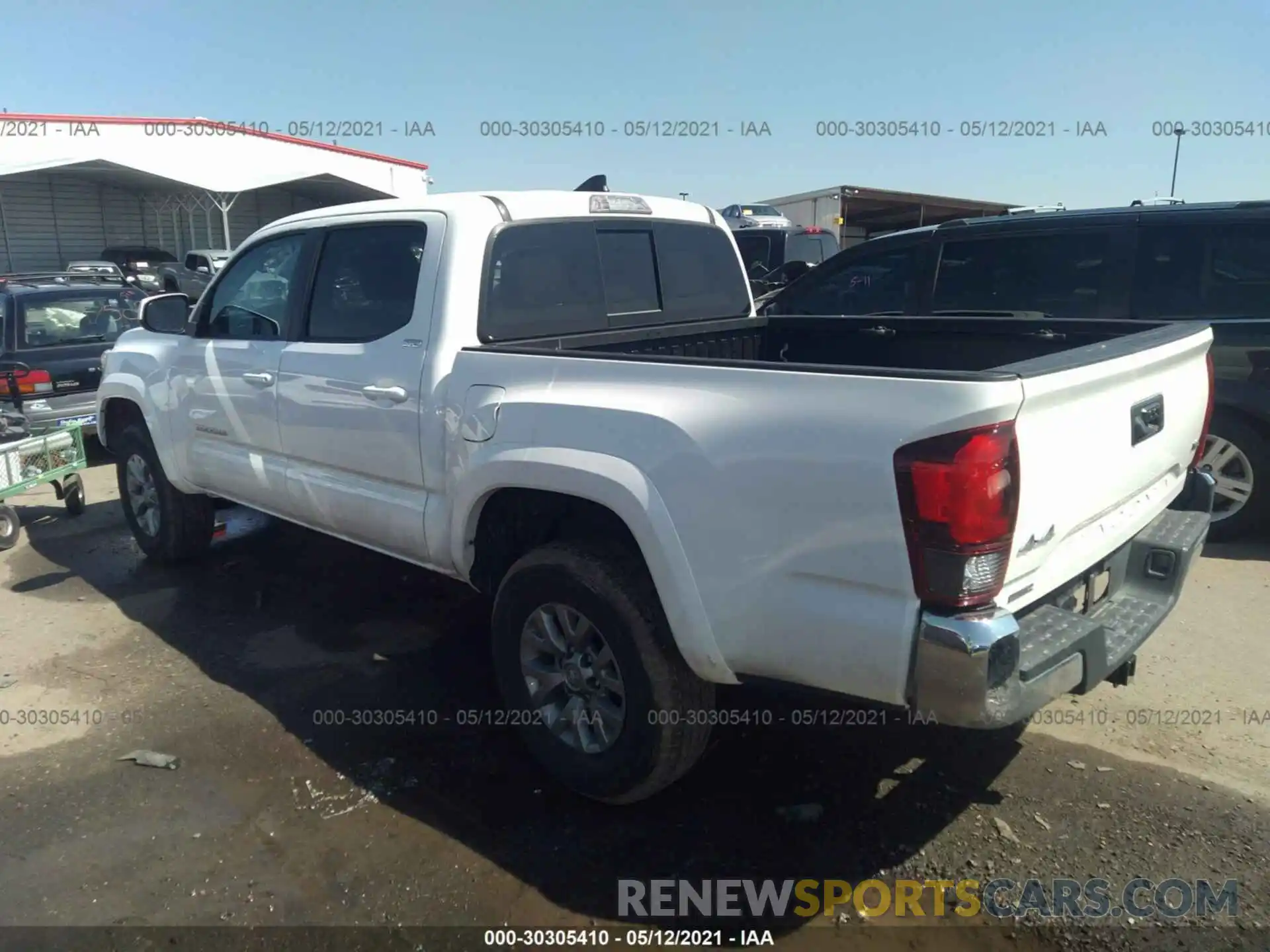 3 Photograph of a damaged car 3TMCZ5AN1KM277525 TOYOTA TACOMA 4WD 2019