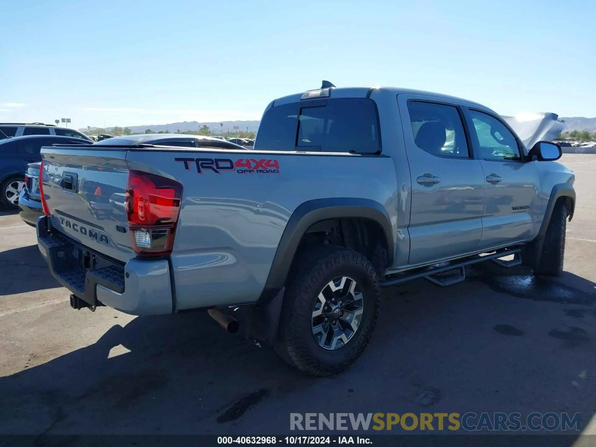 4 Photograph of a damaged car 3TMCZ5AN1KM282546 TOYOTA TACOMA 4WD 2019