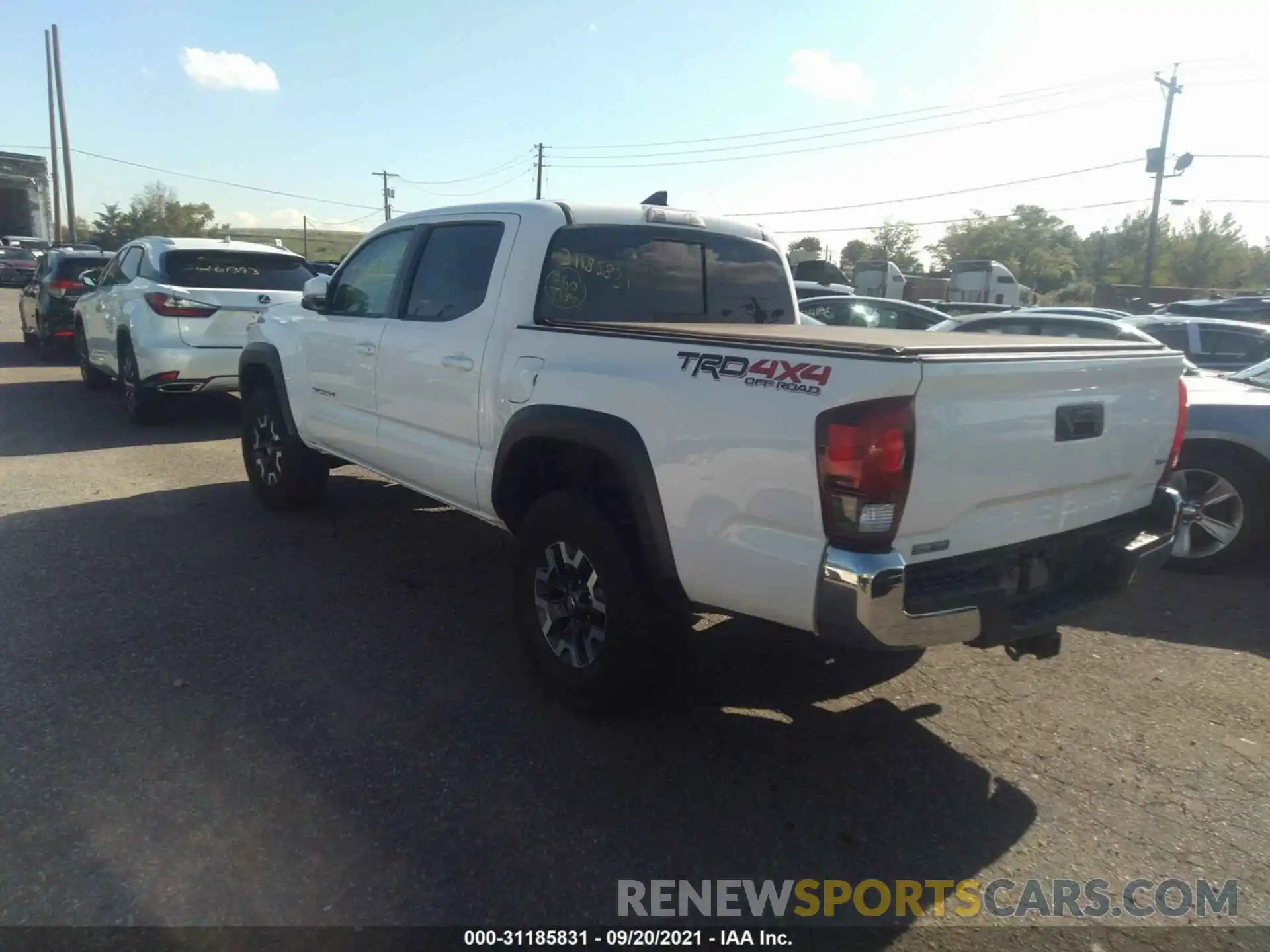 3 Photograph of a damaged car 3TMCZ5AN1KM282708 TOYOTA TACOMA 4WD 2019