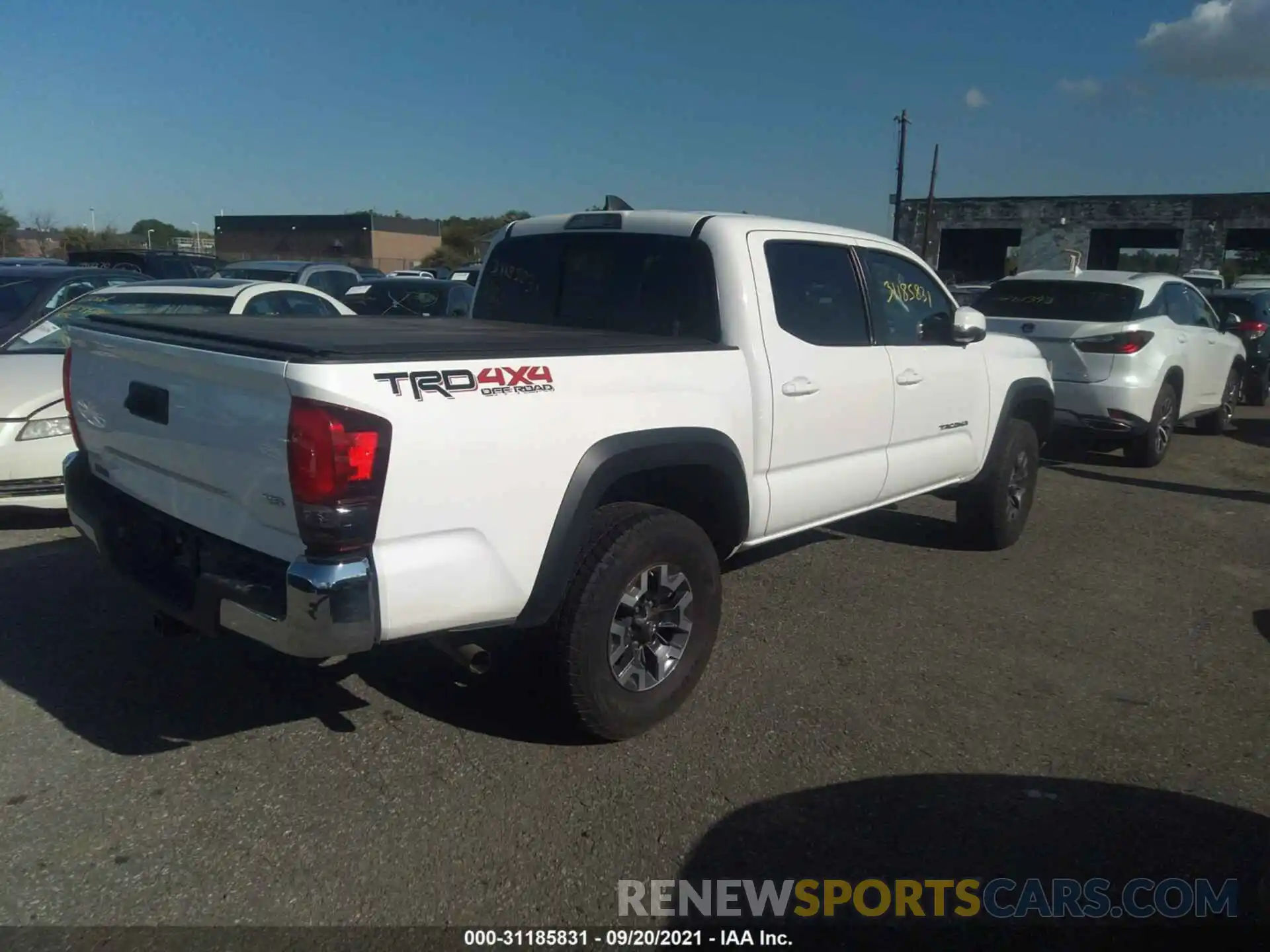 4 Photograph of a damaged car 3TMCZ5AN1KM282708 TOYOTA TACOMA 4WD 2019