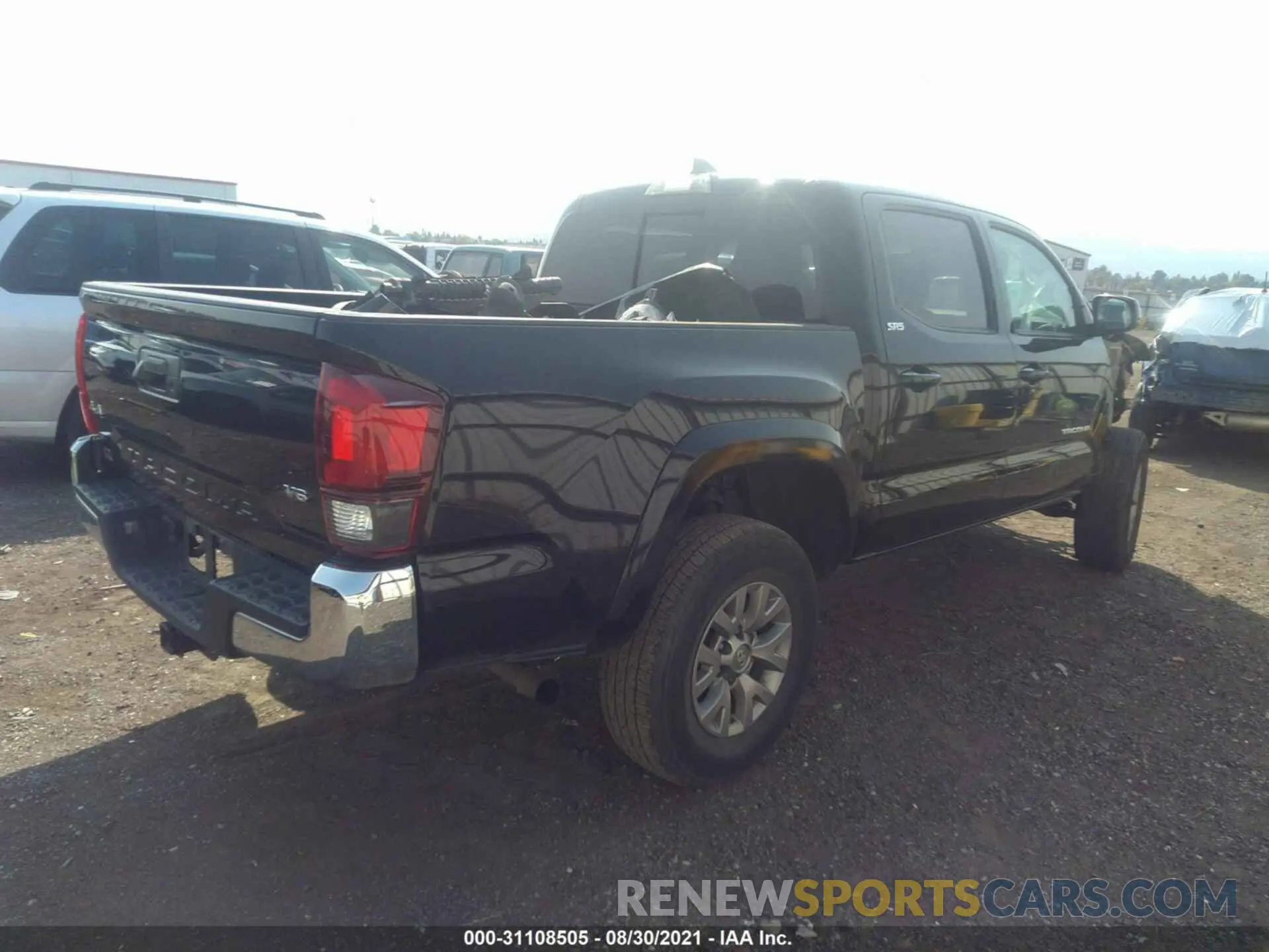 4 Photograph of a damaged car 3TMCZ5AN2KM285200 TOYOTA TACOMA 4WD 2019