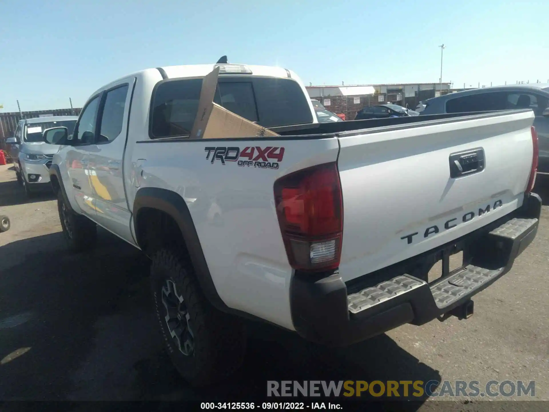 3 Photograph of a damaged car 3TMCZ5AN4KM197751 TOYOTA TACOMA 4WD 2019