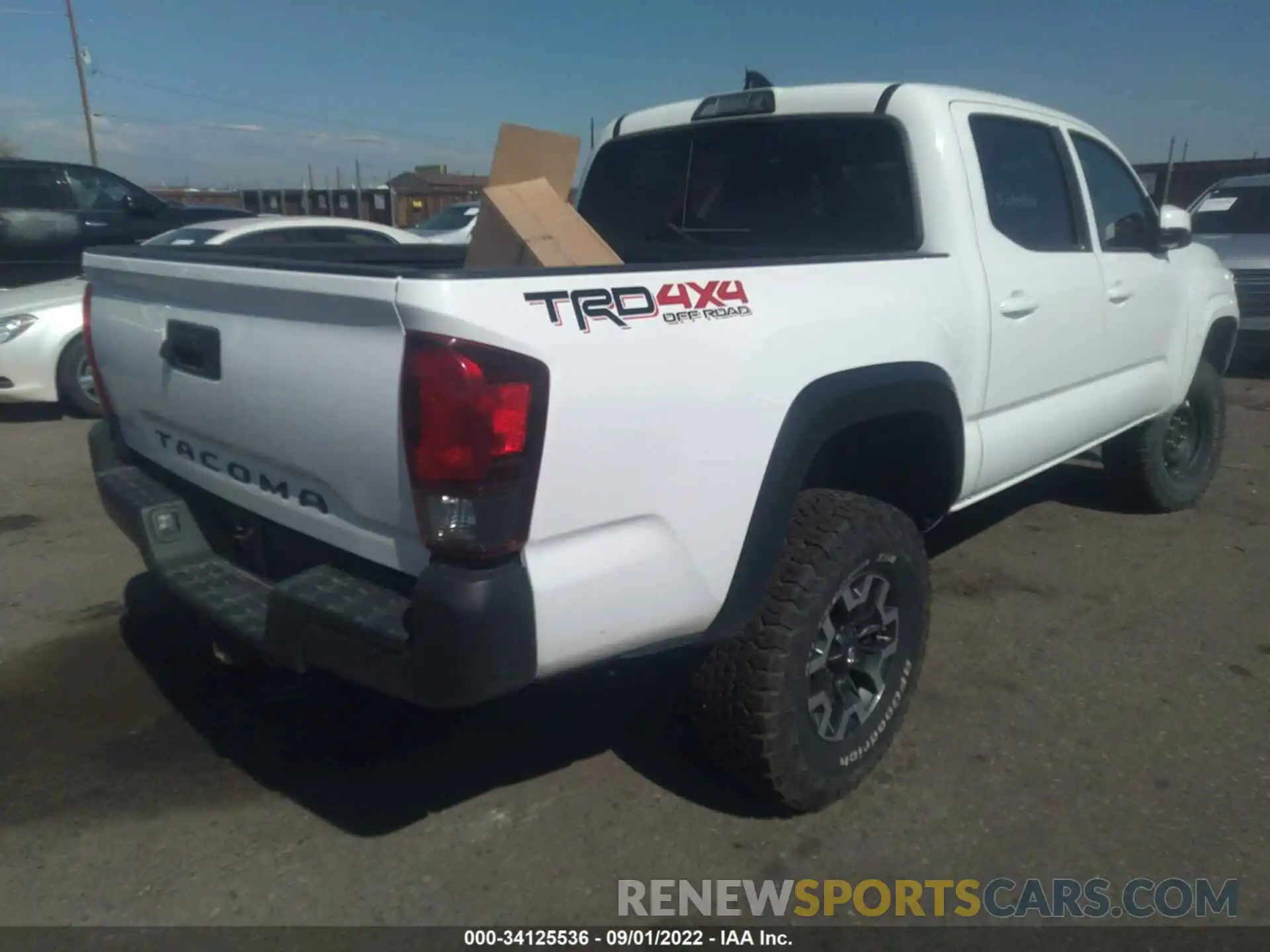 4 Photograph of a damaged car 3TMCZ5AN4KM197751 TOYOTA TACOMA 4WD 2019