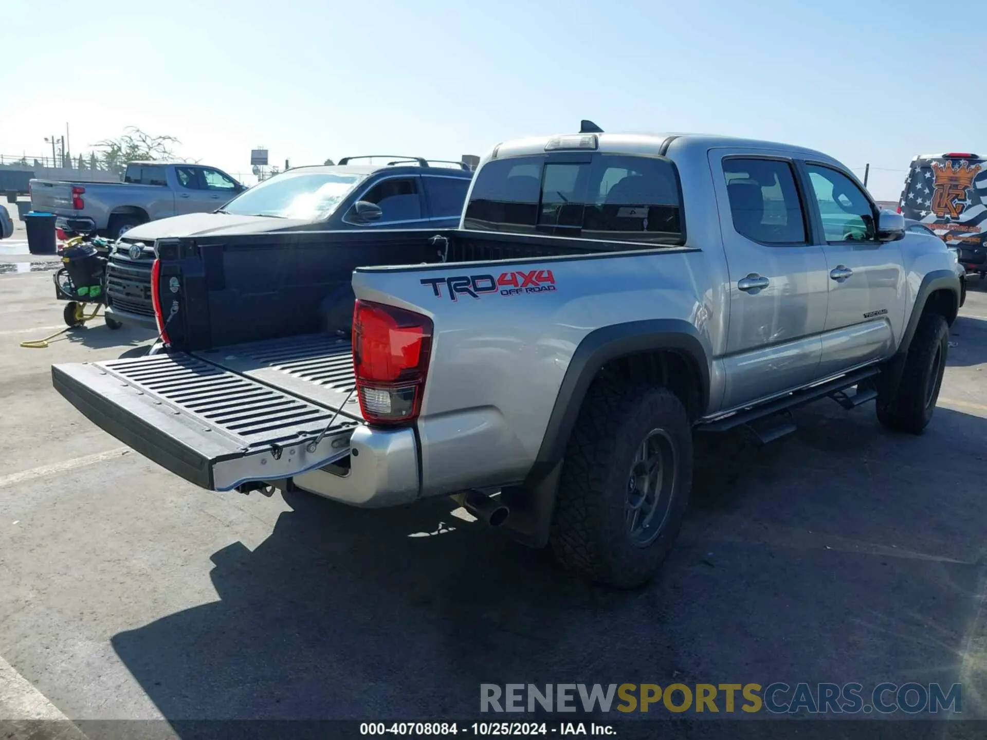 4 Photograph of a damaged car 3TMCZ5AN5KM255303 TOYOTA TACOMA 4WD 2019