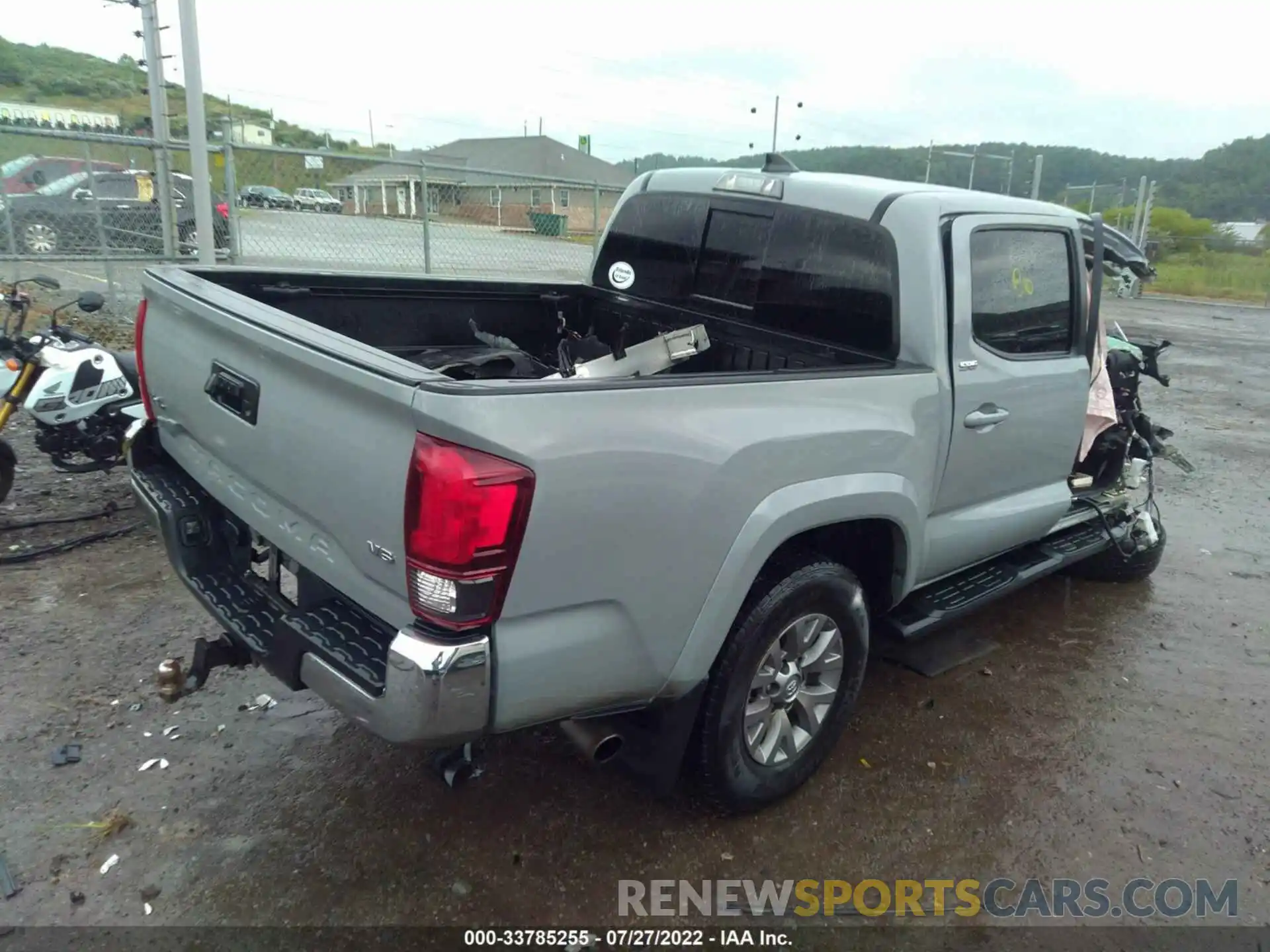 4 Photograph of a damaged car 3TMCZ5AN6KM255147 TOYOTA TACOMA 4WD 2019