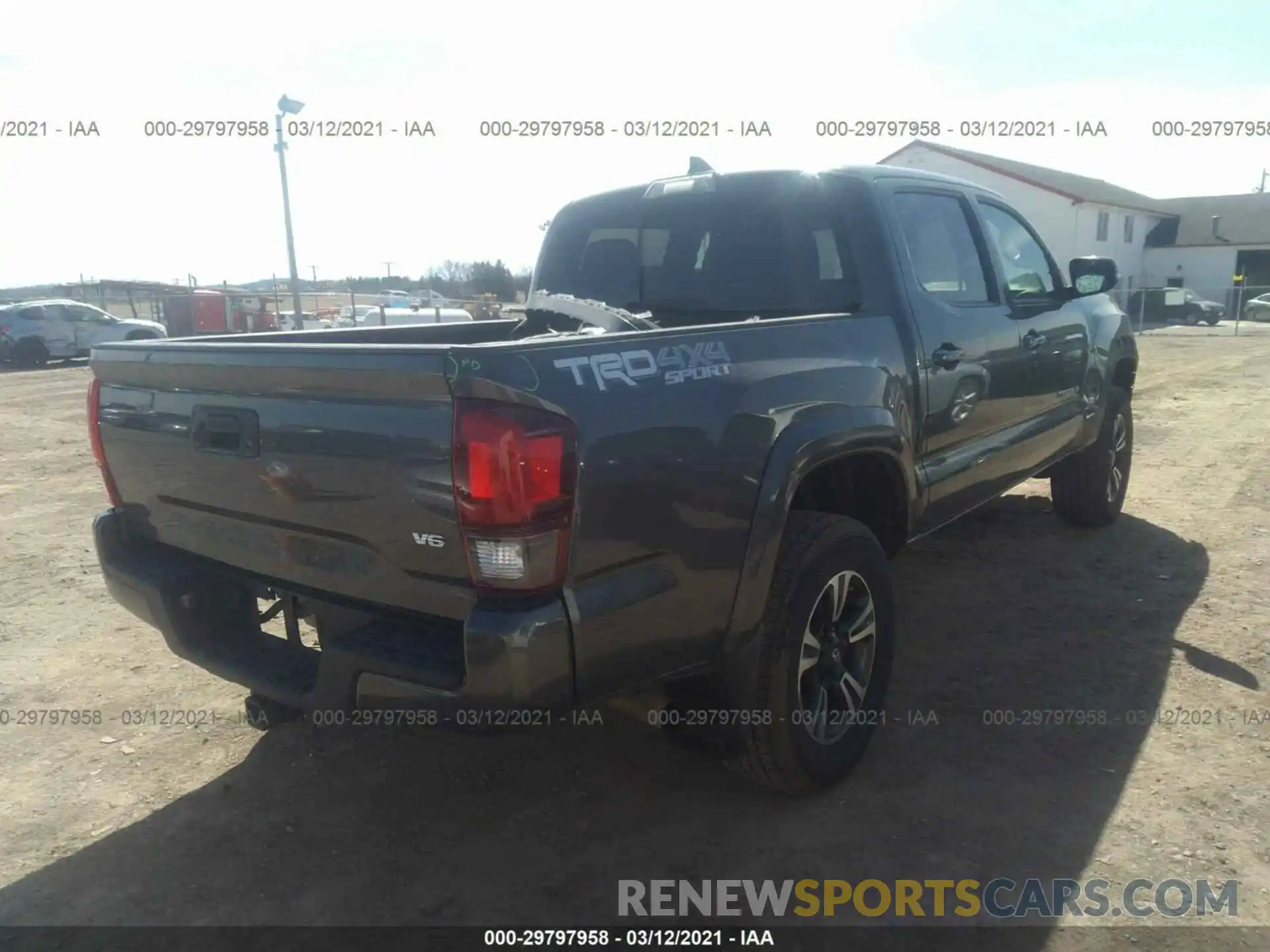 4 Photograph of a damaged car 3TMCZ5AN7KM216910 TOYOTA TACOMA 4WD 2019