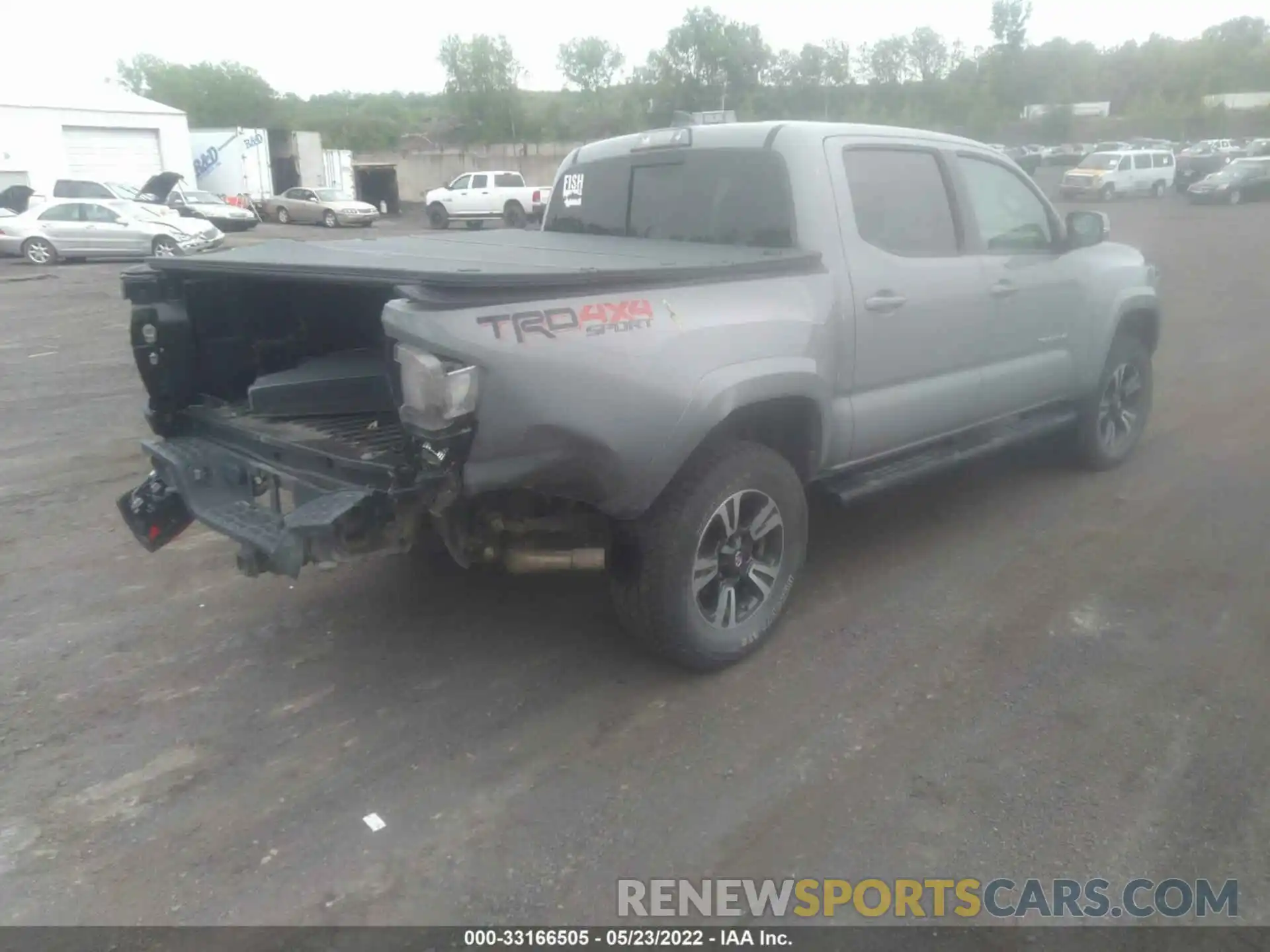 4 Photograph of a damaged car 3TMCZ5AN7KM262351 TOYOTA TACOMA 4WD 2019