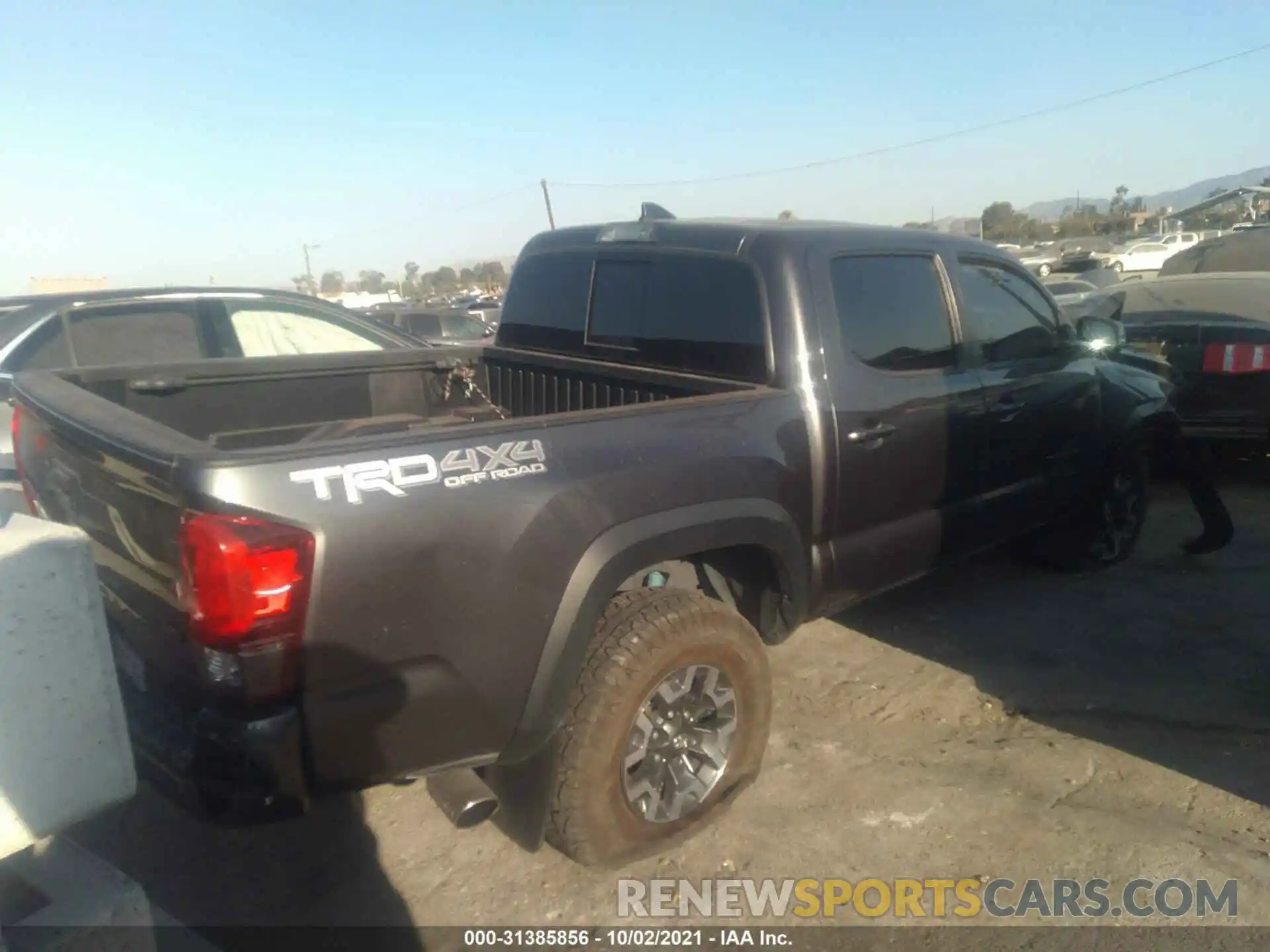 4 Photograph of a damaged car 3TMCZ5AN9KM191945 TOYOTA TACOMA 4WD 2019