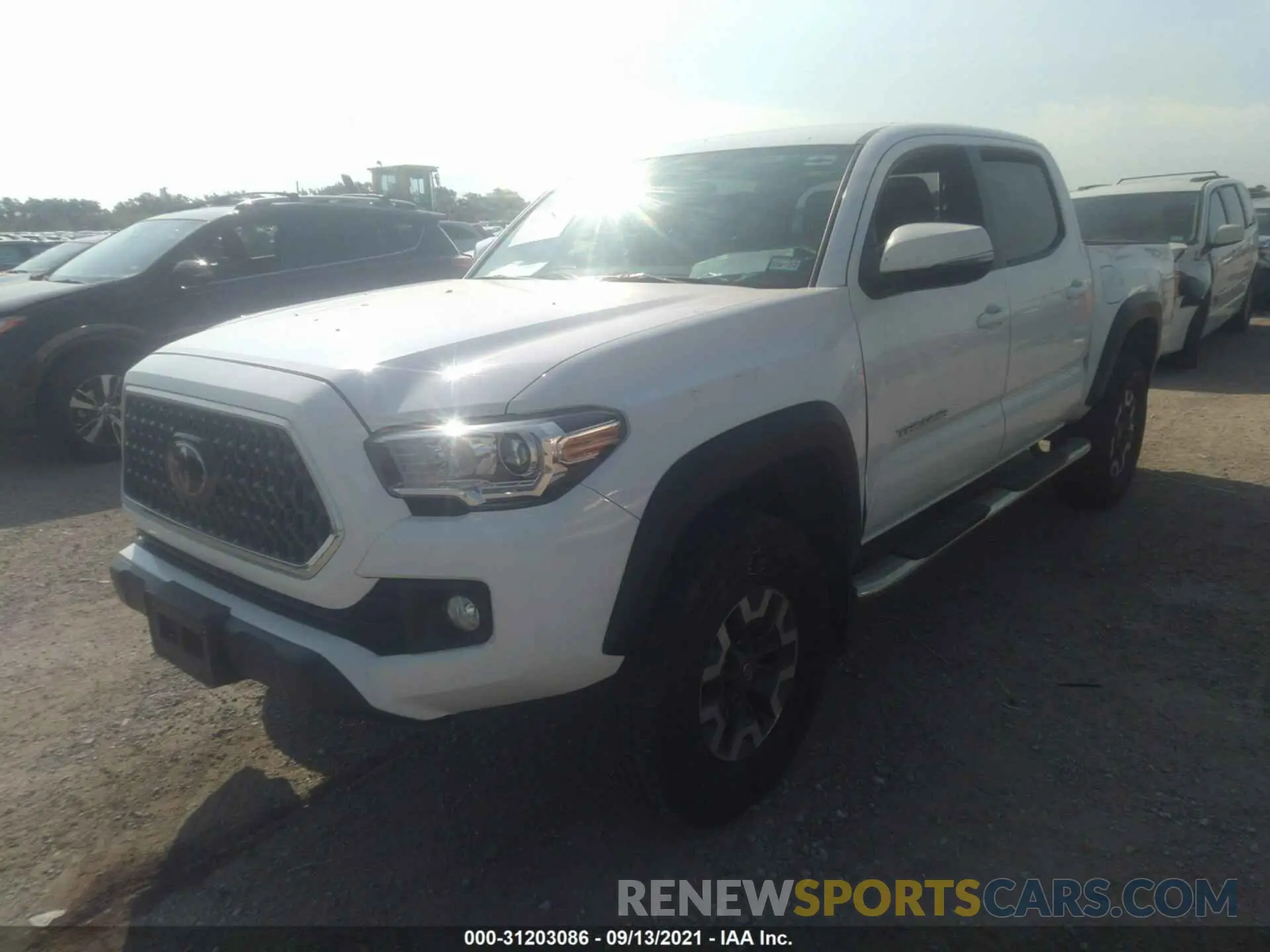 2 Photograph of a damaged car 3TMCZ5AN9KM269186 TOYOTA TACOMA 4WD 2019
