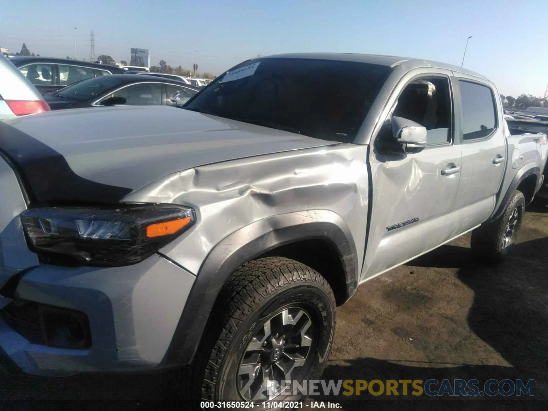 2 Photograph of a damaged car 3TMCZ5AN9KM276235 TOYOTA TACOMA 4WD 2019