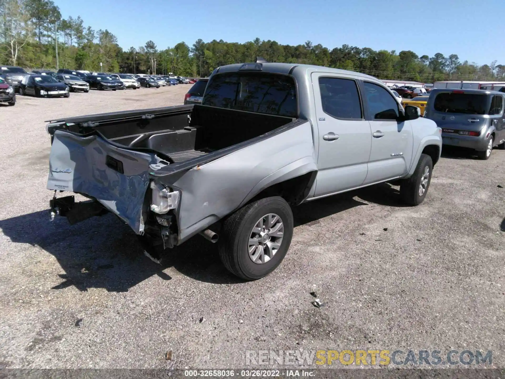 4 Photograph of a damaged car 3TMCZ5ANXKM279435 TOYOTA TACOMA 4WD 2019