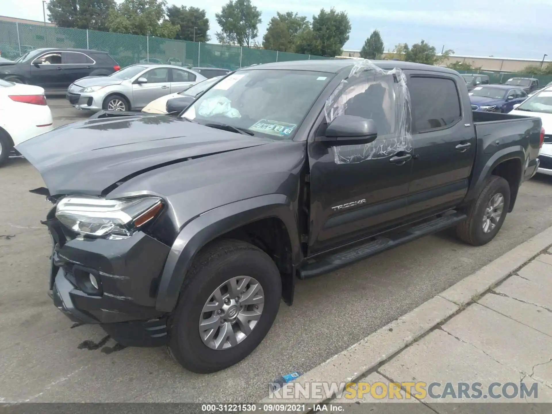 2 Photograph of a damaged car 3TMCZ5ANXKM279743 TOYOTA TACOMA 4WD 2019