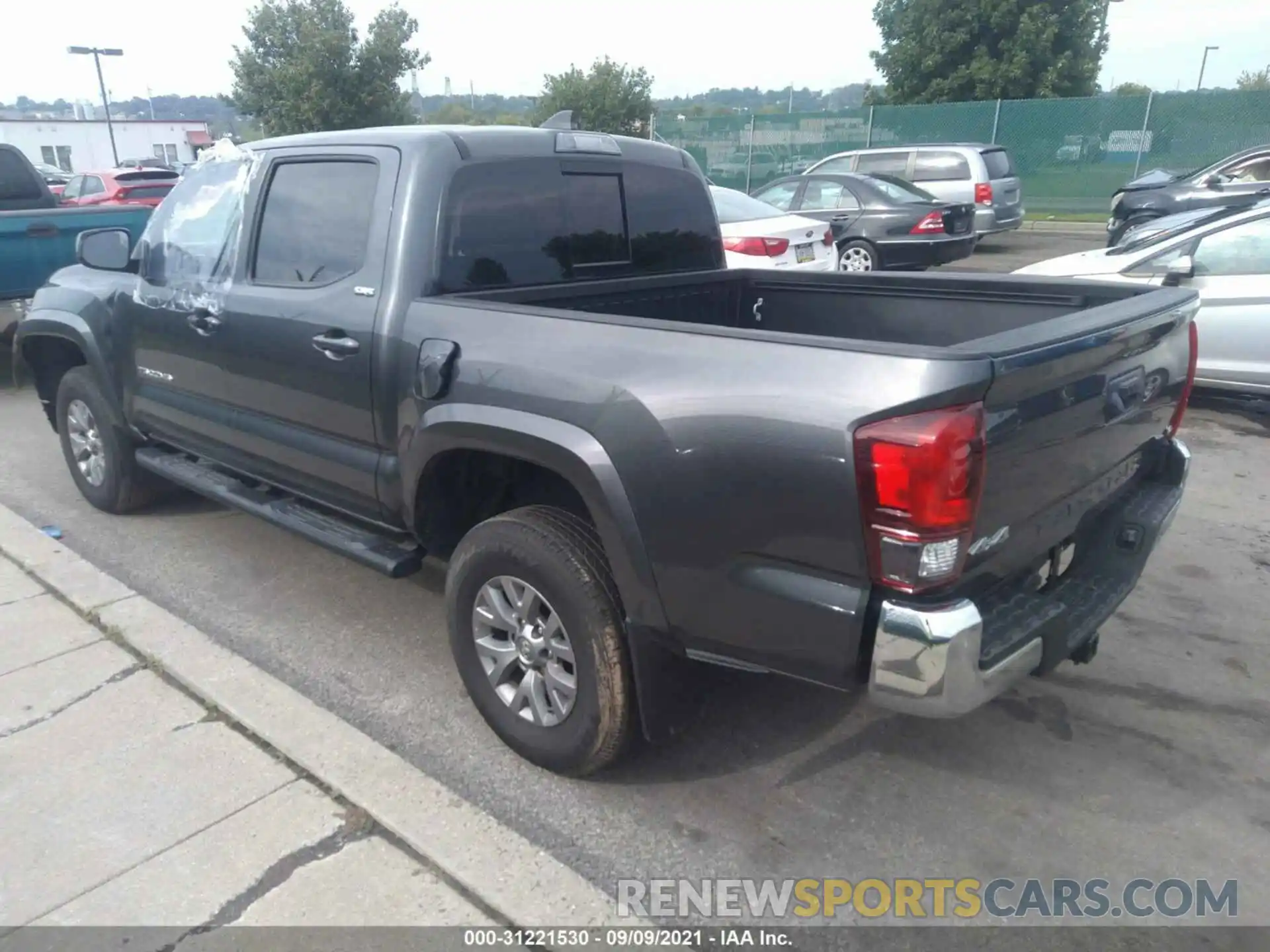 3 Photograph of a damaged car 3TMCZ5ANXKM279743 TOYOTA TACOMA 4WD 2019