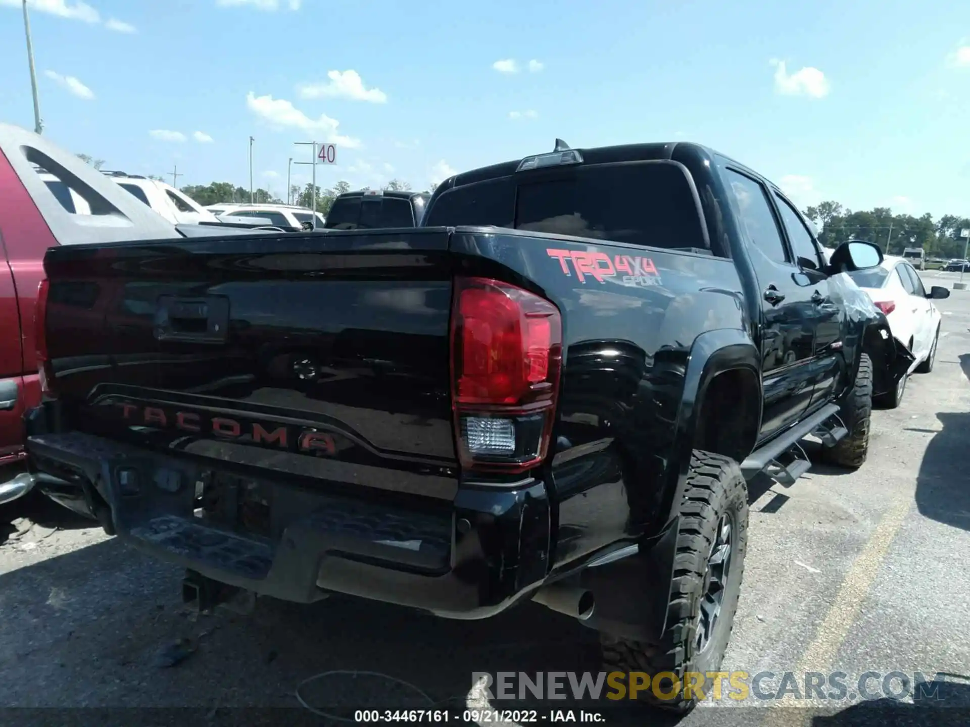 4 Photograph of a damaged car 3TMCZ5ANXKM286711 TOYOTA TACOMA 4WD 2019