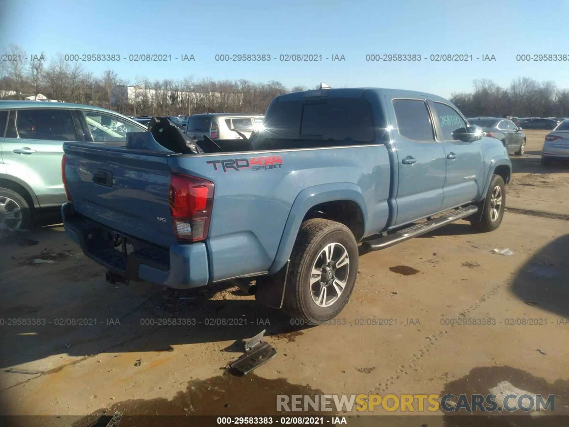 4 Photograph of a damaged car 3TMDZ5BN0KM069994 TOYOTA TACOMA 4WD 2019