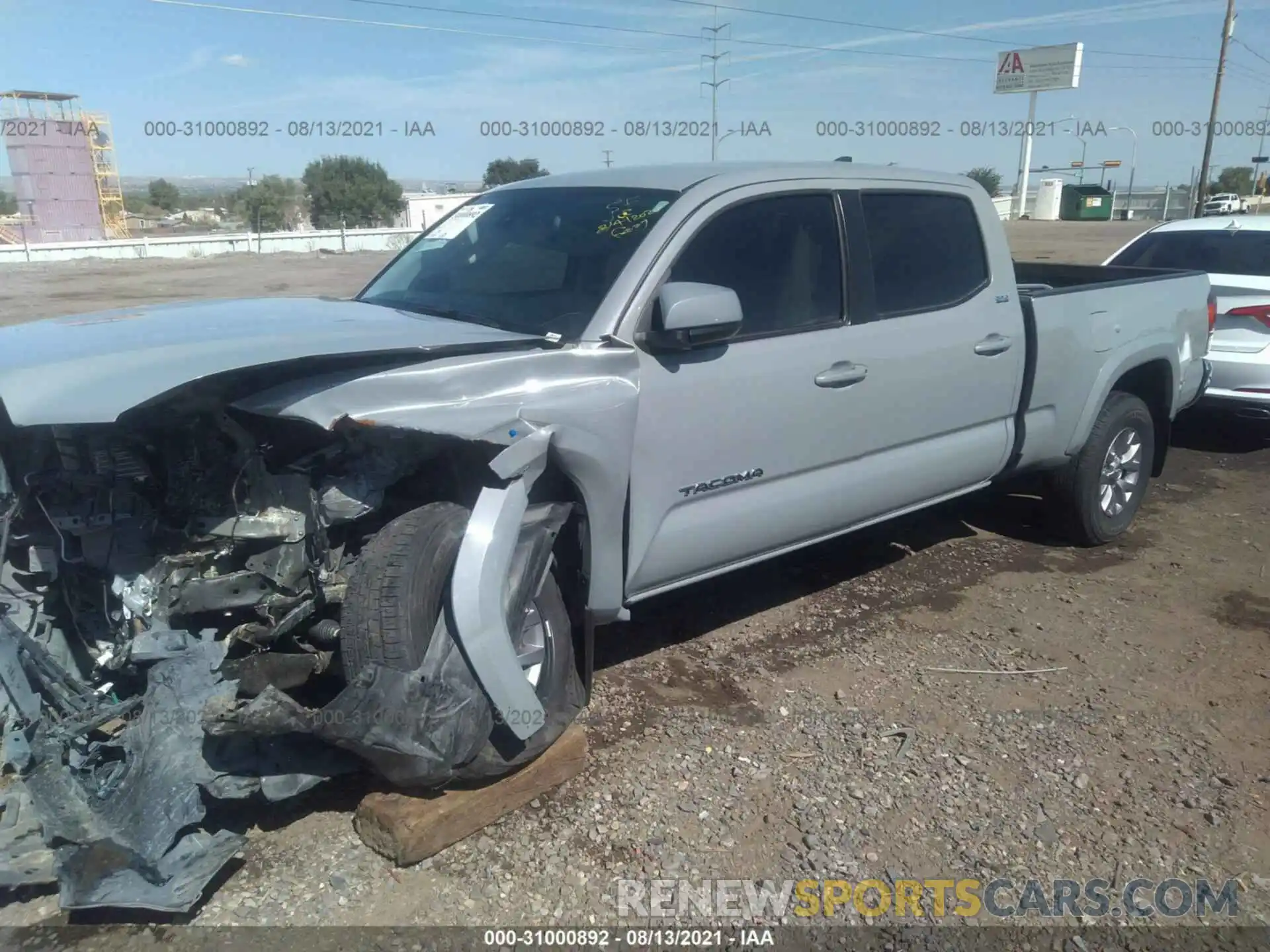 2 Photograph of a damaged car 3TMDZ5BN0KM074676 TOYOTA TACOMA 4WD 2019