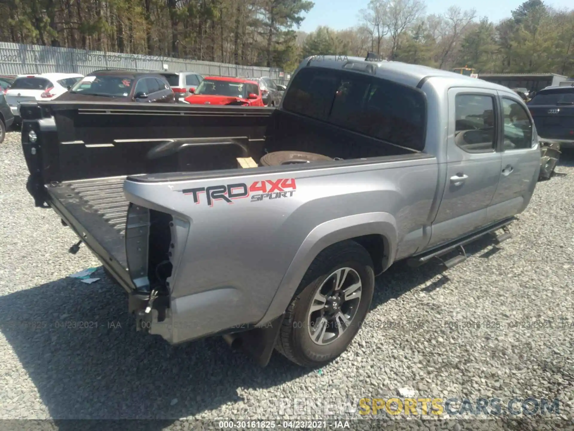 4 Photograph of a damaged car 3TMDZ5BN1KM078039 TOYOTA TACOMA 4WD 2019