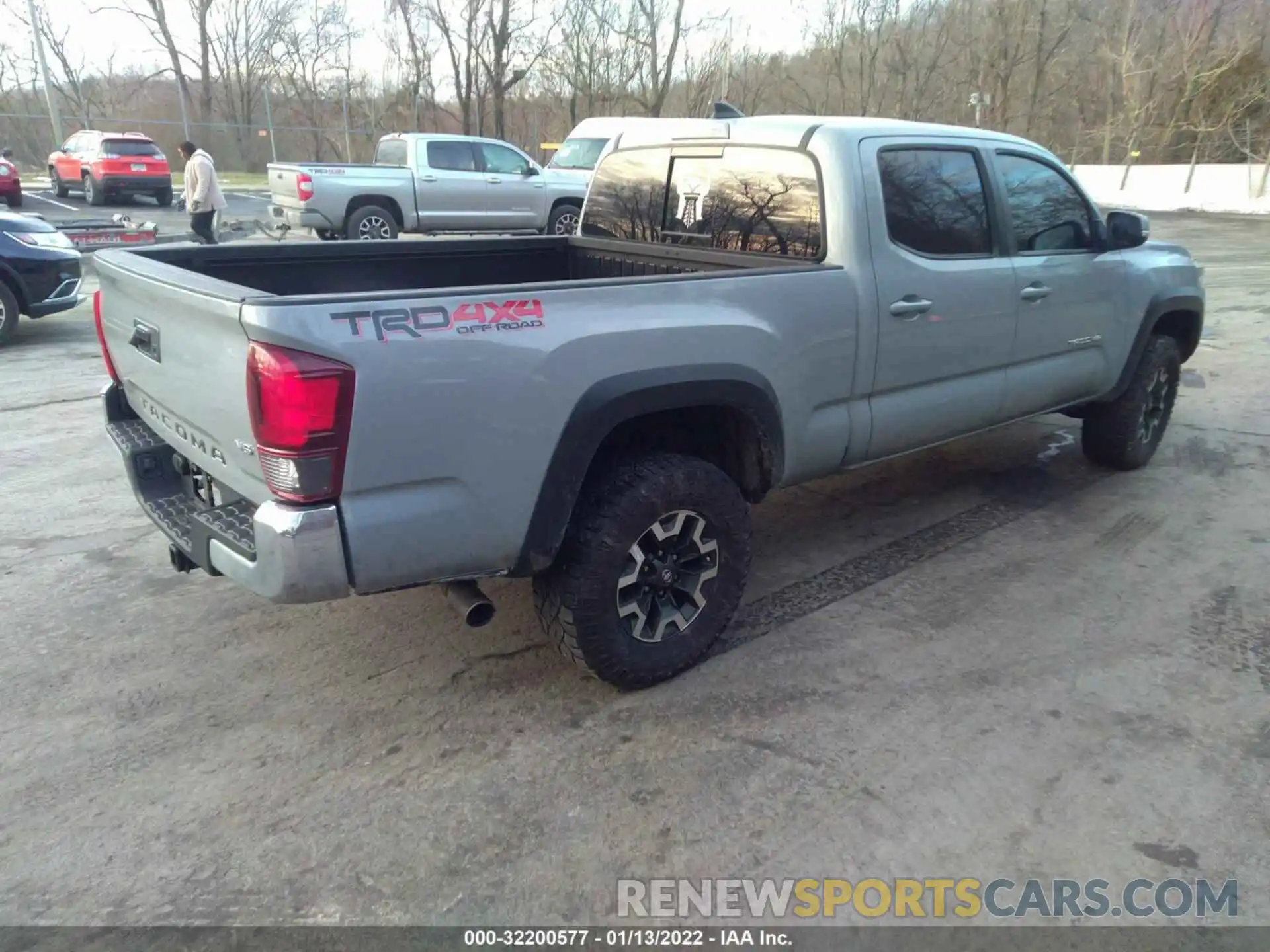 4 Photograph of a damaged car 3TMDZ5BN7KM061648 TOYOTA TACOMA 4WD 2019