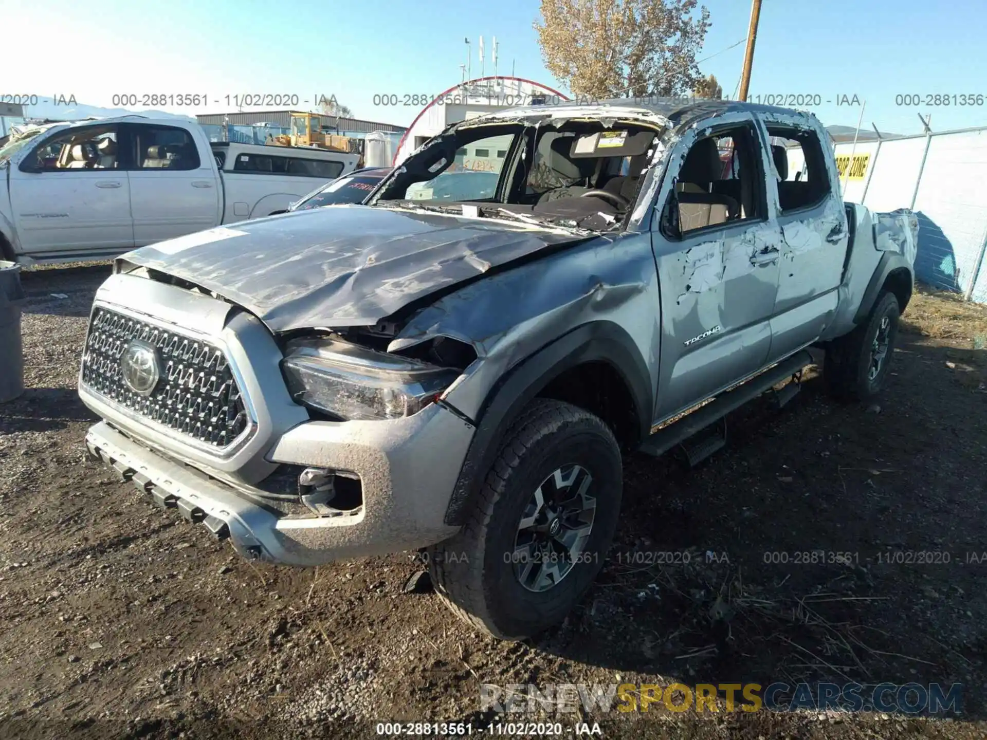 2 Photograph of a damaged car 3TMDZ5BN8KM055339 TOYOTA TACOMA 4WD 2019