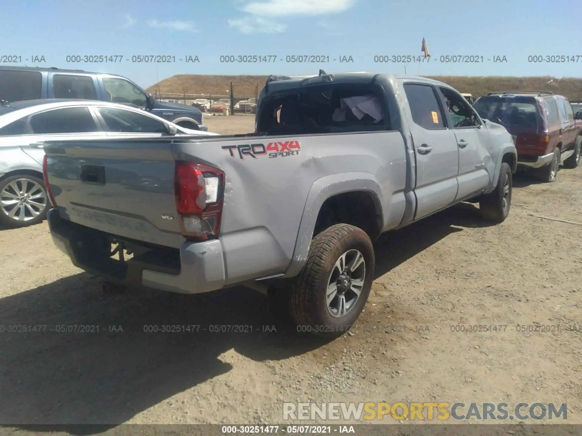 4 Photograph of a damaged car 3TMDZ5BN8KM067152 TOYOTA TACOMA 4WD 2019