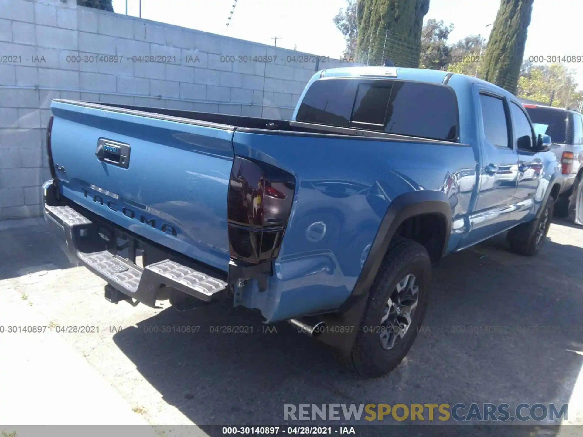 4 Photograph of a damaged car 3TMDZ5BNXKM057755 TOYOTA TACOMA 4WD 2019