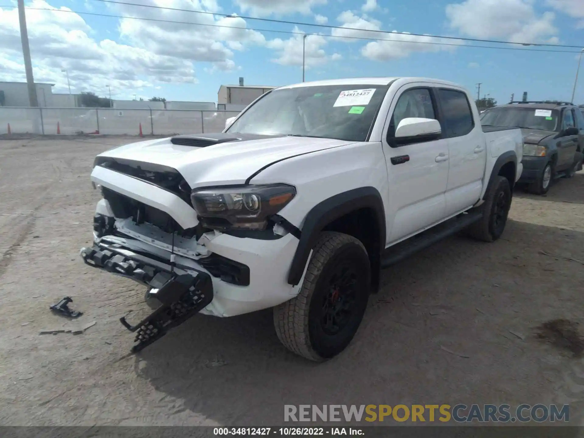 2 Photograph of a damaged car 5TFCZ5AN1KX186989 TOYOTA TACOMA 4WD 2019