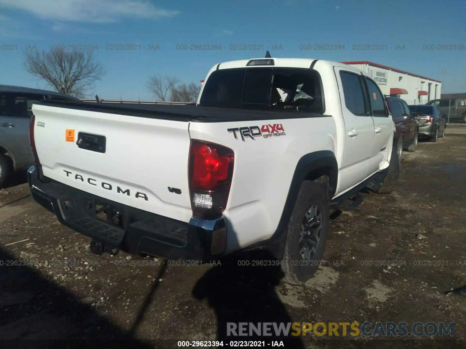 4 Photograph of a damaged car 5TFCZ5AN1KX207078 TOYOTA TACOMA 4WD 2019