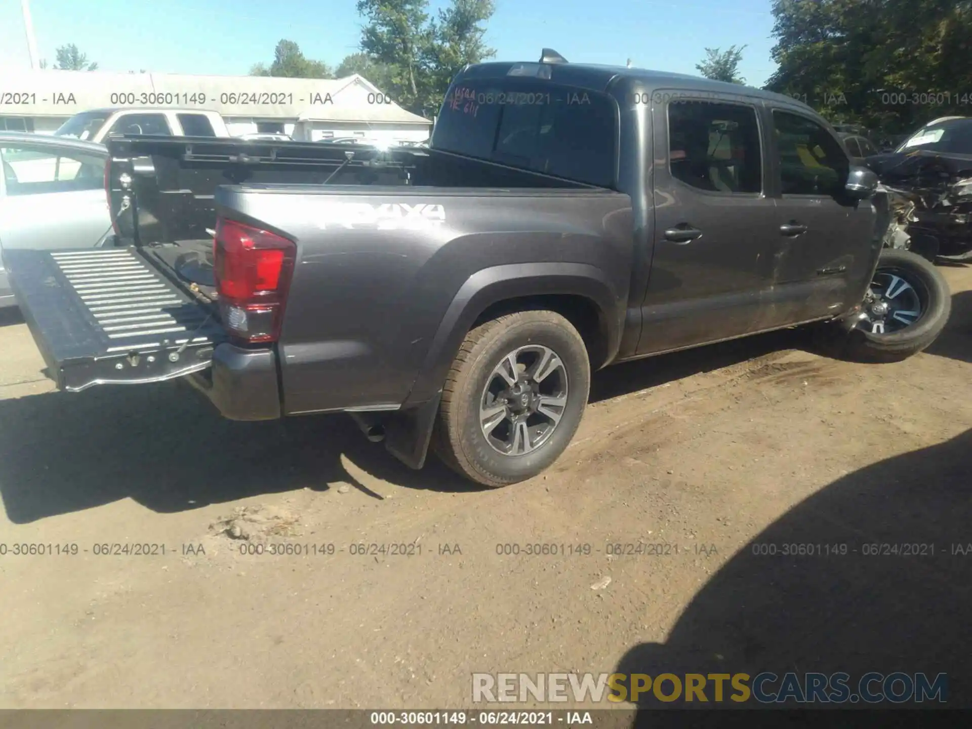 4 Photograph of a damaged car 5TFCZ5AN5KX179723 TOYOTA TACOMA 4WD 2019