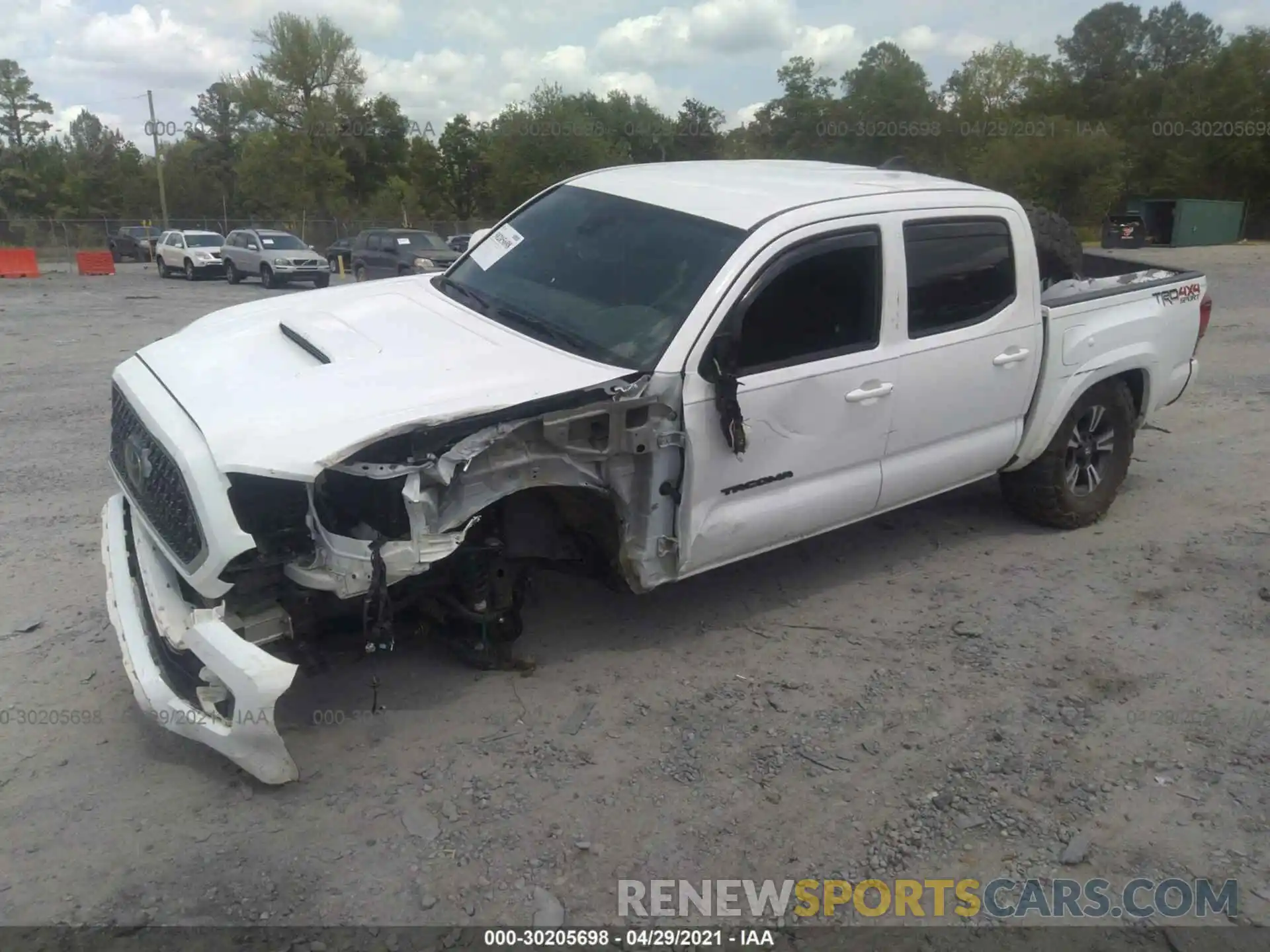 2 Photograph of a damaged car 5TFCZ5AN8KX188612 TOYOTA TACOMA 4WD 2019