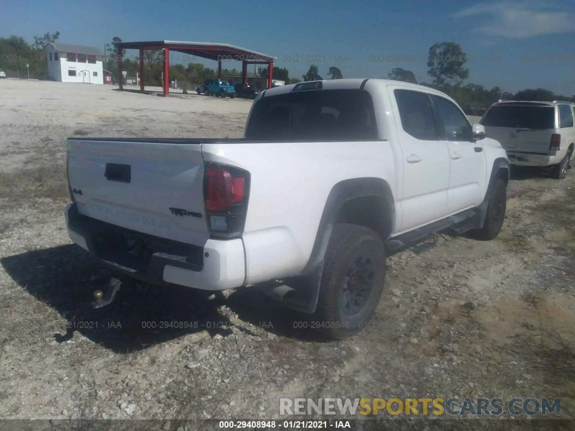 4 Photograph of a damaged car 5TFCZ5AN9KX183418 TOYOTA TACOMA 4WD 2019