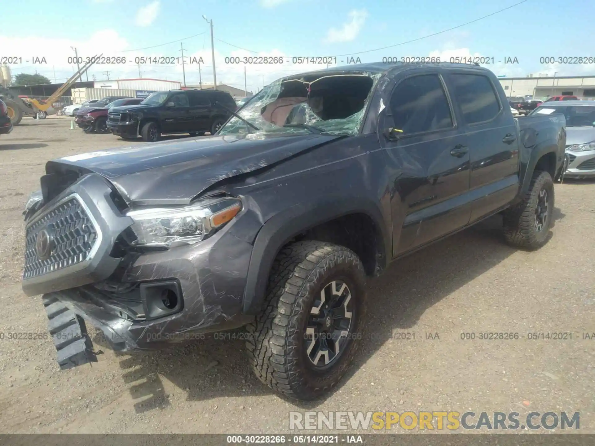 2 Photograph of a damaged car 5TFCZ5ANXKX174078 TOYOTA TACOMA 4WD 2019