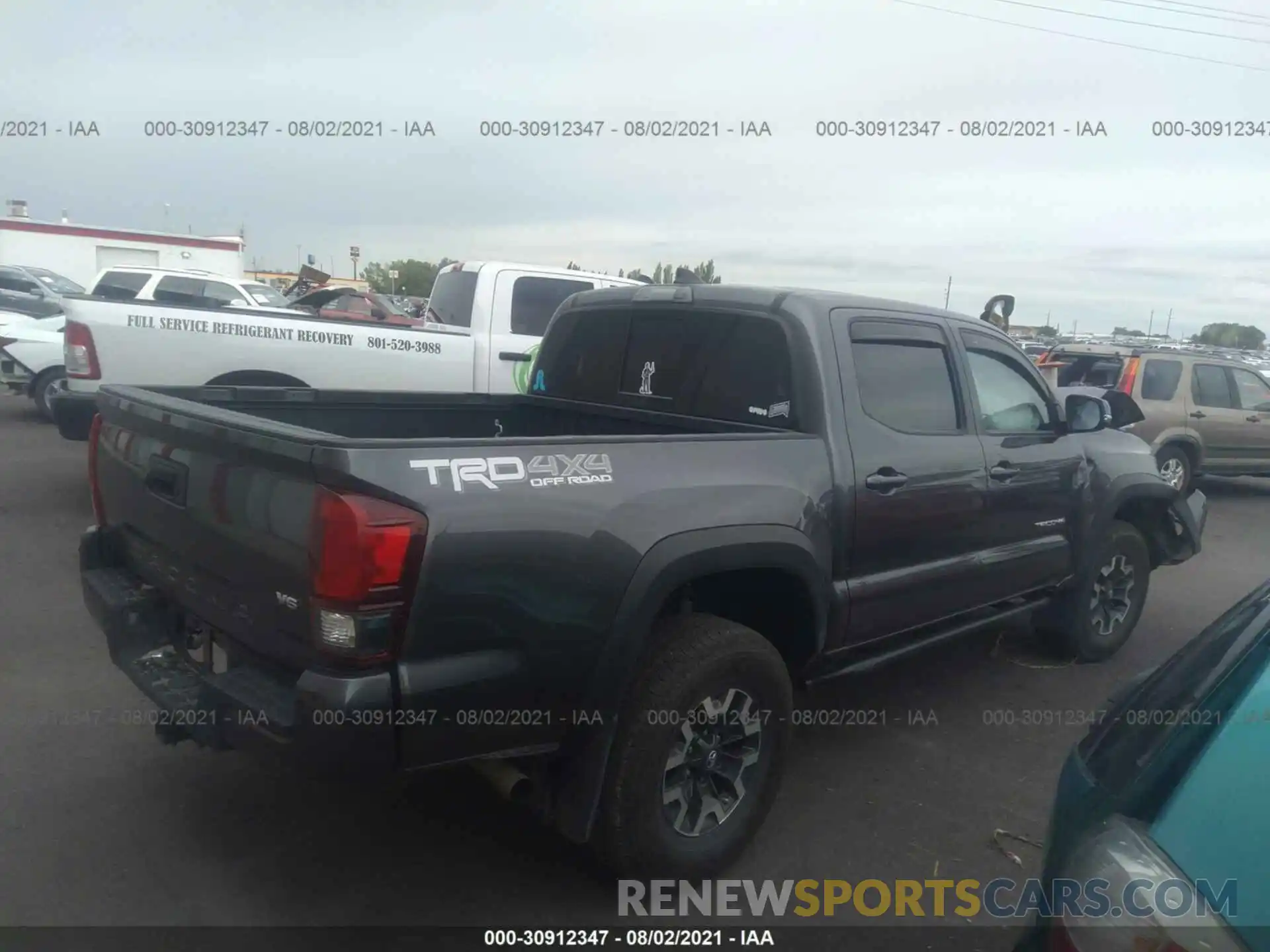 4 Photograph of a damaged car 5TFCZ5ANXKX185968 TOYOTA TACOMA 4WD 2019