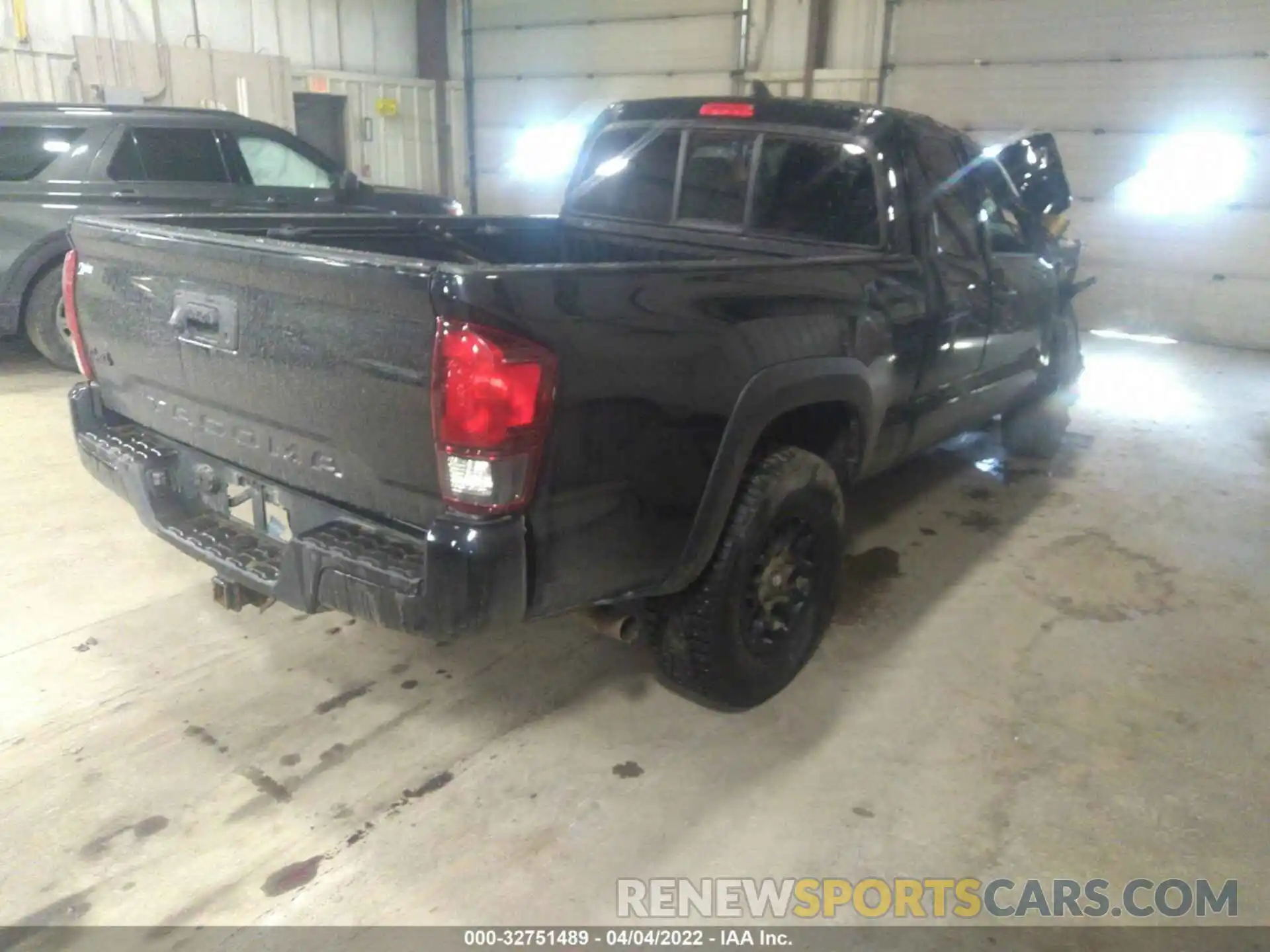 4 Photograph of a damaged car 5TFSZ5AN1KX203060 TOYOTA TACOMA 4WD 2019