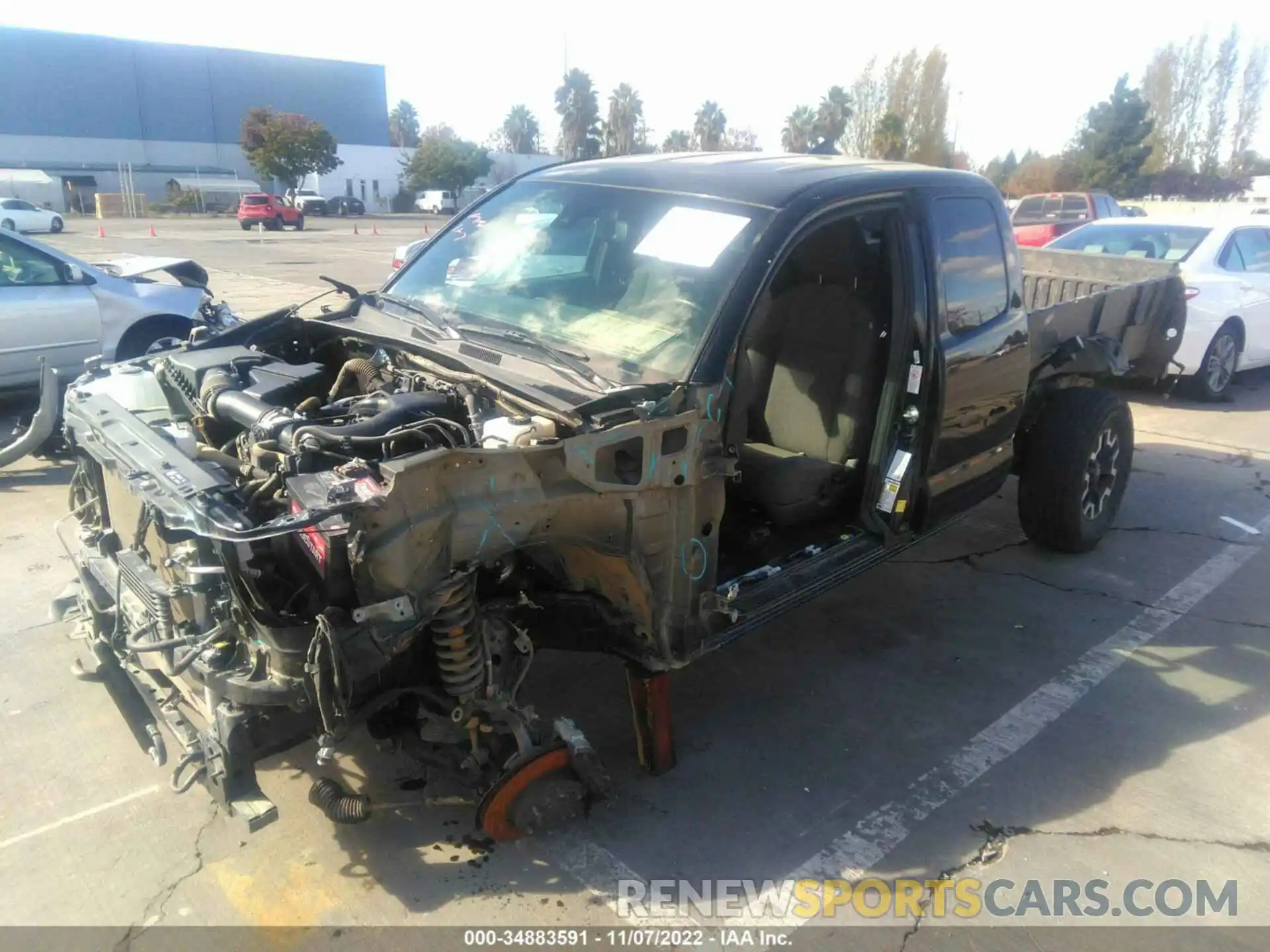 2 Photograph of a damaged car 5TFSZ5AN6KX169097 TOYOTA TACOMA 4WD 2019