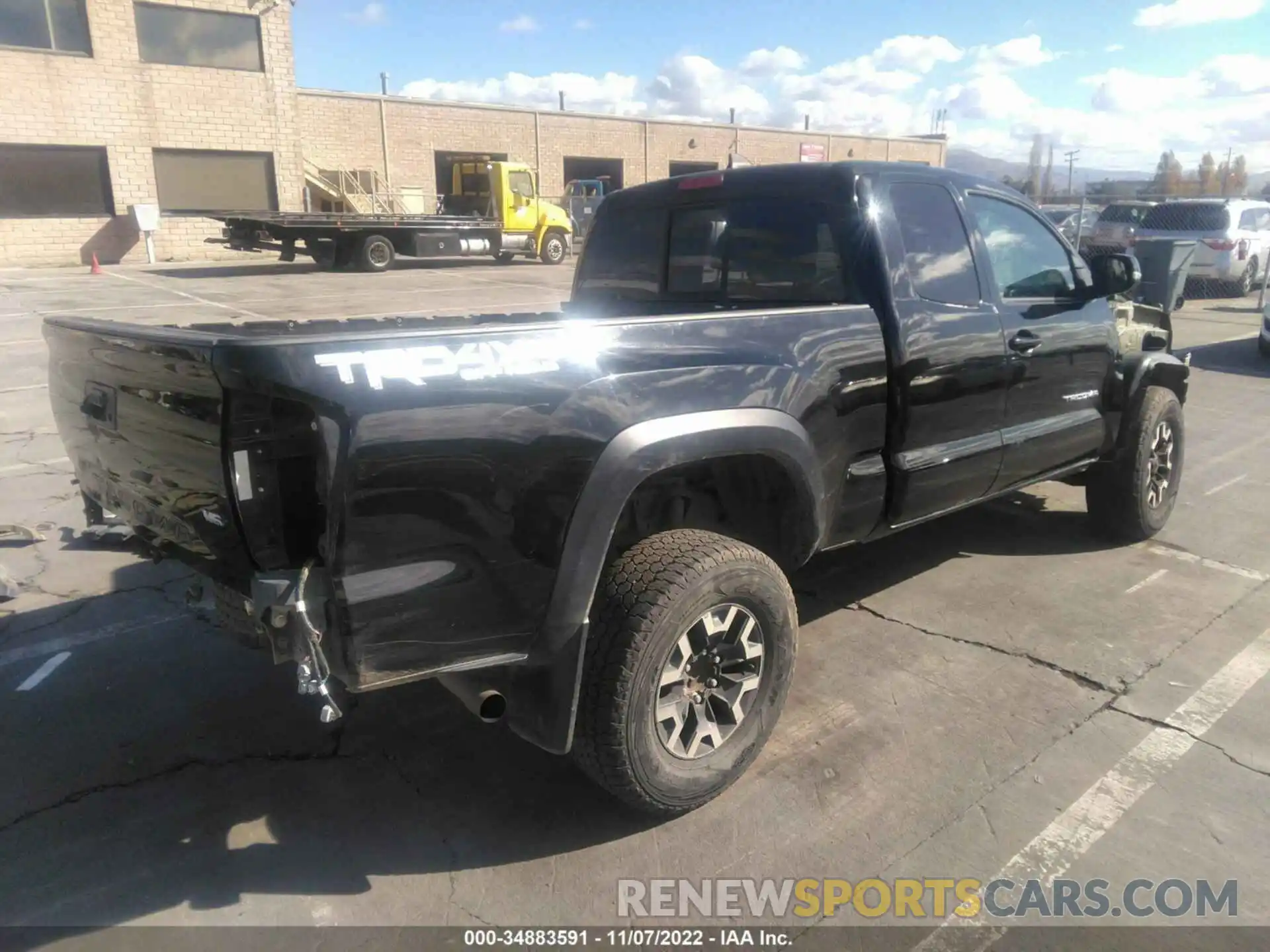 4 Photograph of a damaged car 5TFSZ5AN6KX169097 TOYOTA TACOMA 4WD 2019