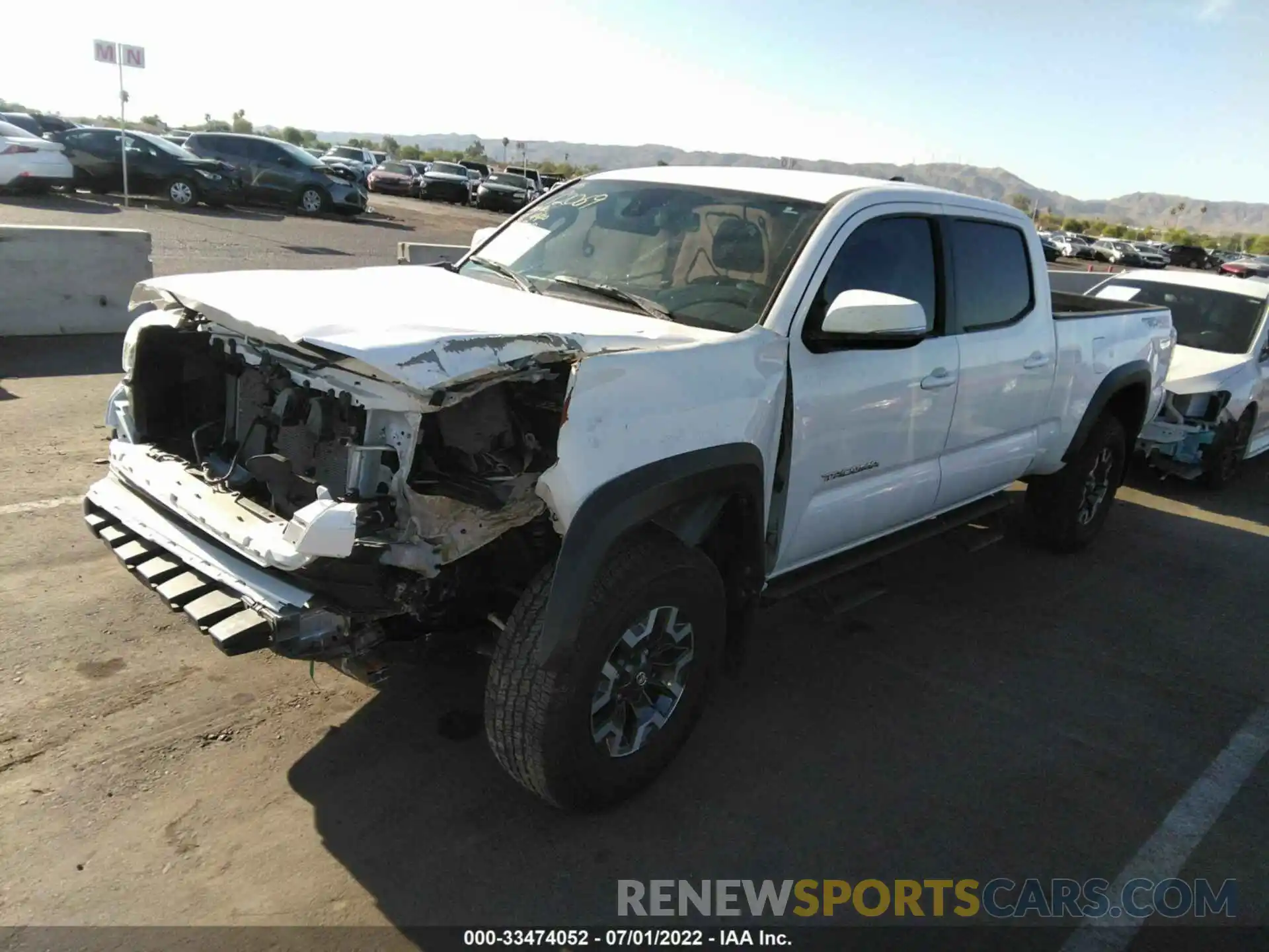 2 Photograph of a damaged car 3TMDZ5BN1LM095697 TOYOTA TACOMA 4WD 2020