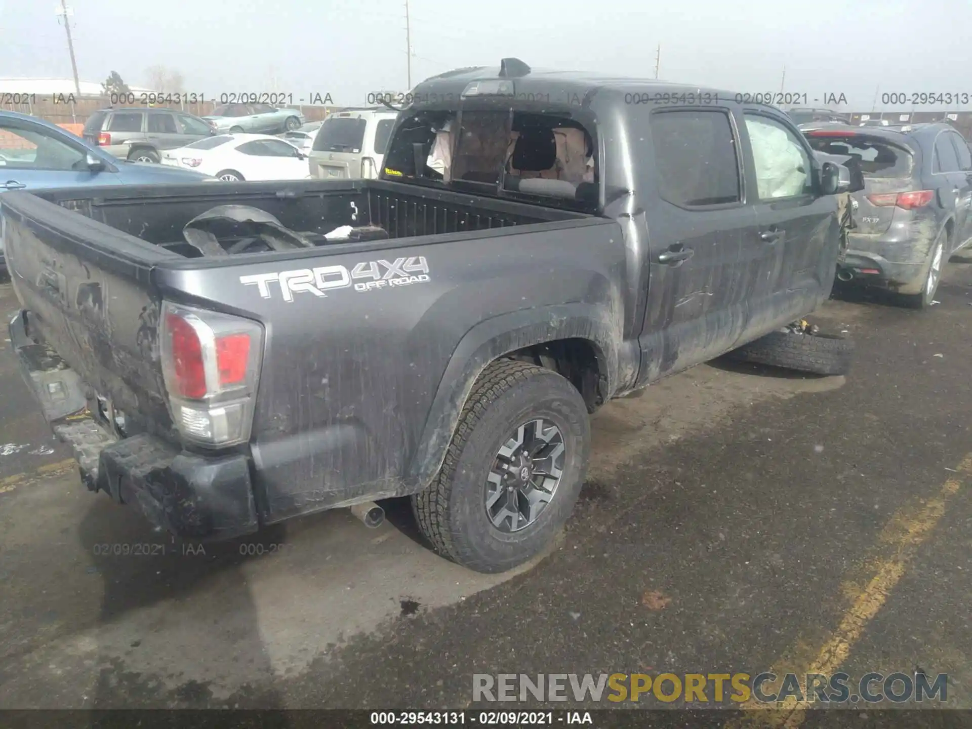 4 Photograph of a damaged car 5TFCZ5AN7LX213856 TOYOTA TACOMA 4WD 2020