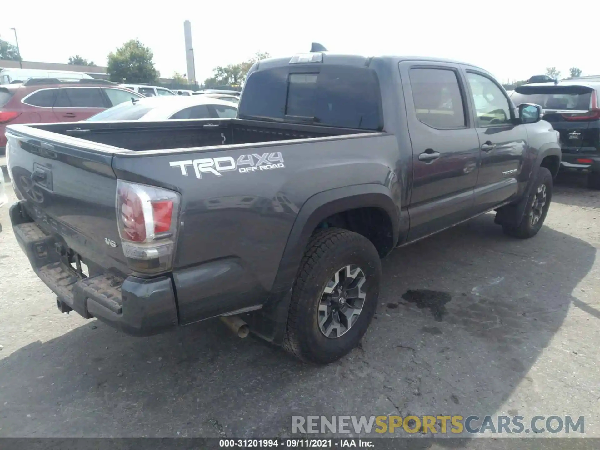 4 Photograph of a damaged car 3TMCZ5AN3MM371490 TOYOTA TACOMA 4WD 2021