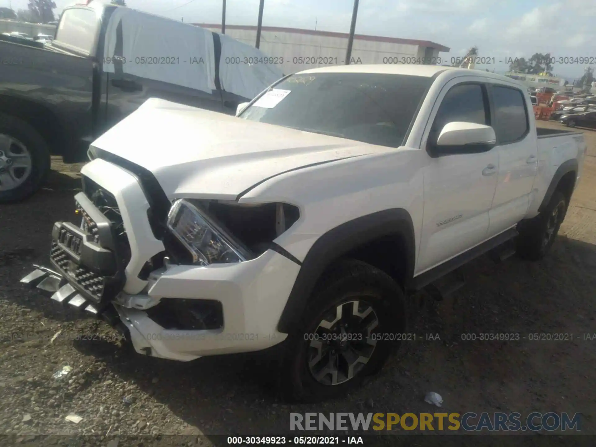 2 Photograph of a damaged car 3TMDZ5BN0MM099533 TOYOTA TACOMA 4WD 2021