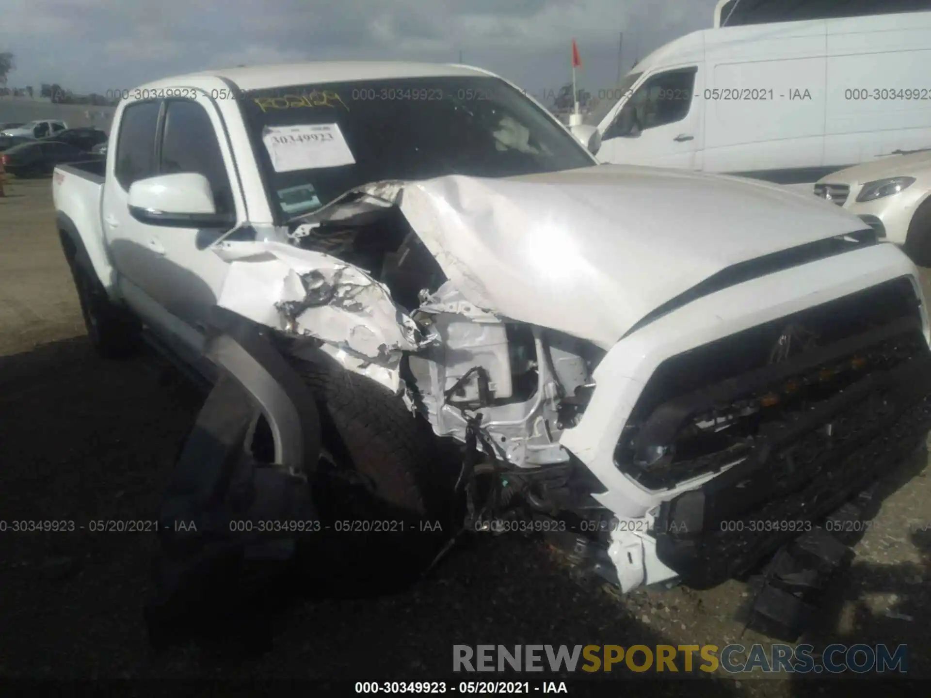 6 Photograph of a damaged car 3TMDZ5BN0MM099533 TOYOTA TACOMA 4WD 2021