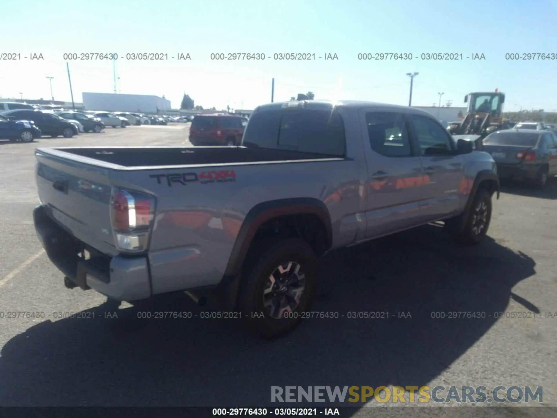 4 Photograph of a damaged car 3TMDZ5BN6MM102340 TOYOTA TACOMA 4WD 2021