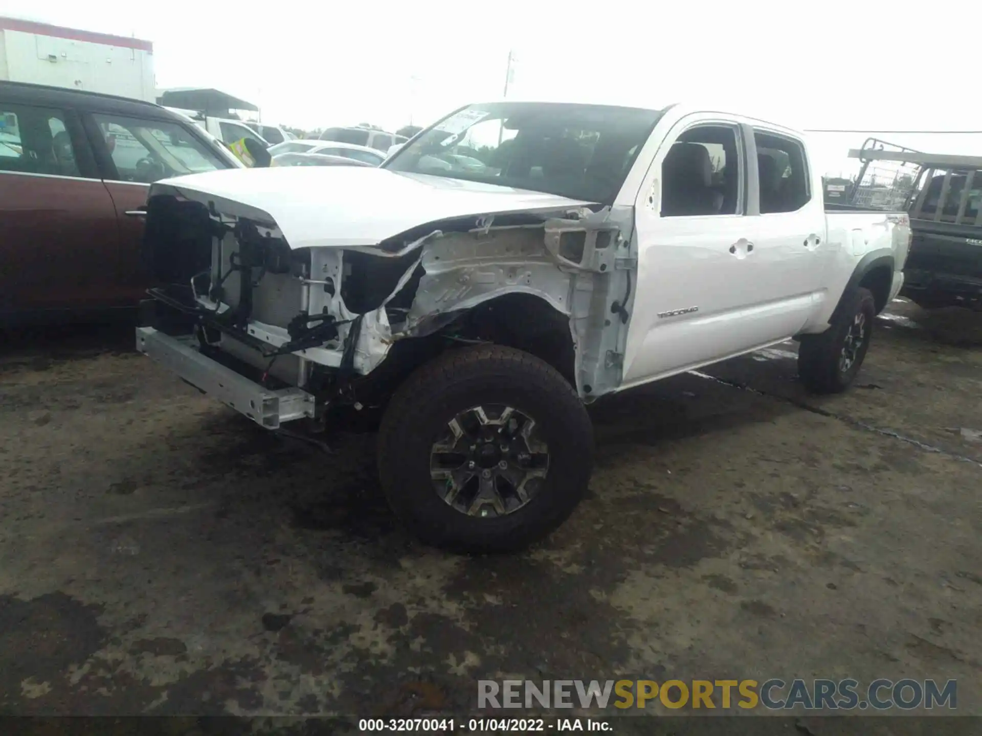 2 Photograph of a damaged car 3TMDZ5BN7MM121026 TOYOTA TACOMA 4WD 2021